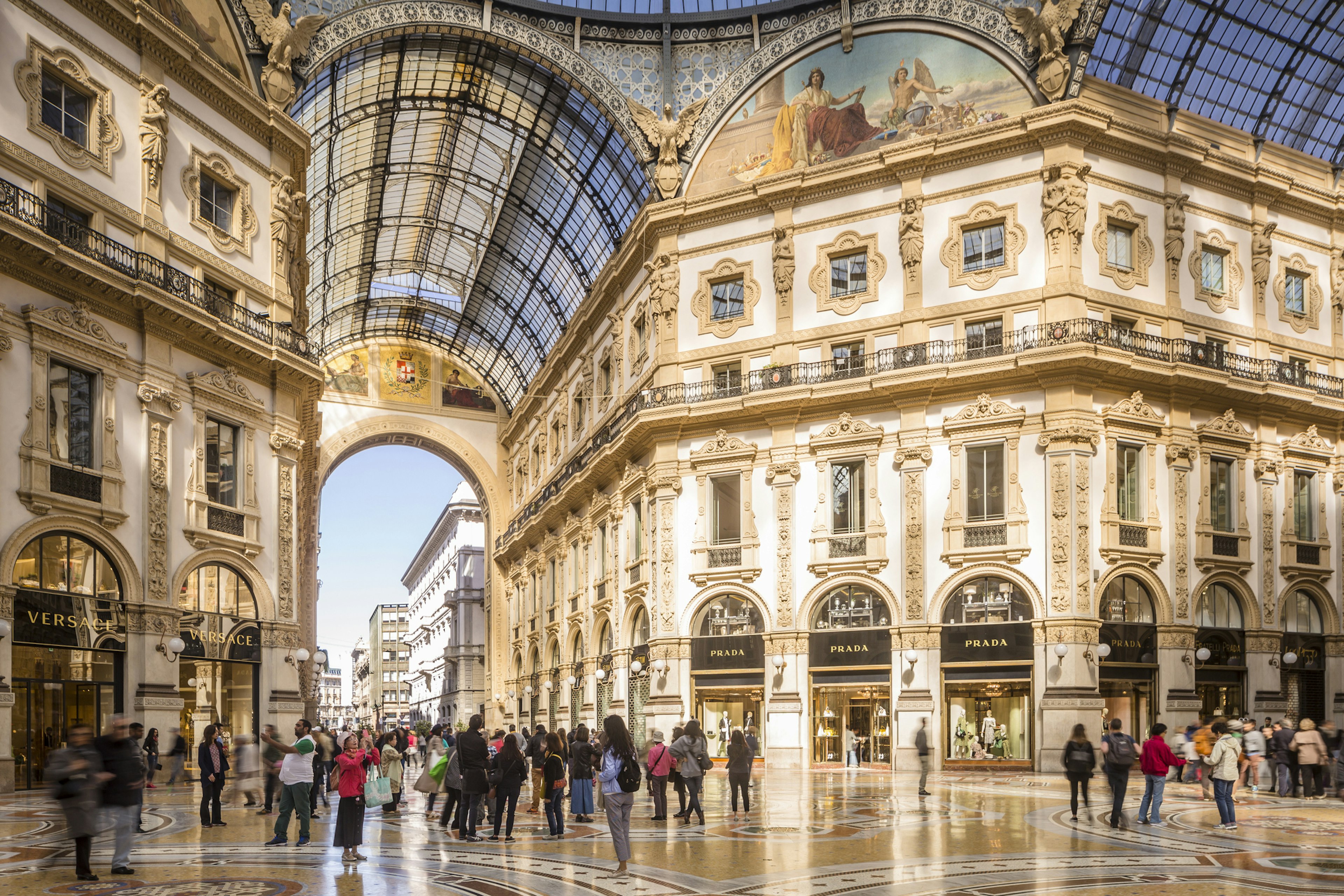 The interior of the Galleria Vittorio Emanuele II in Milan with the original Prada store in the background