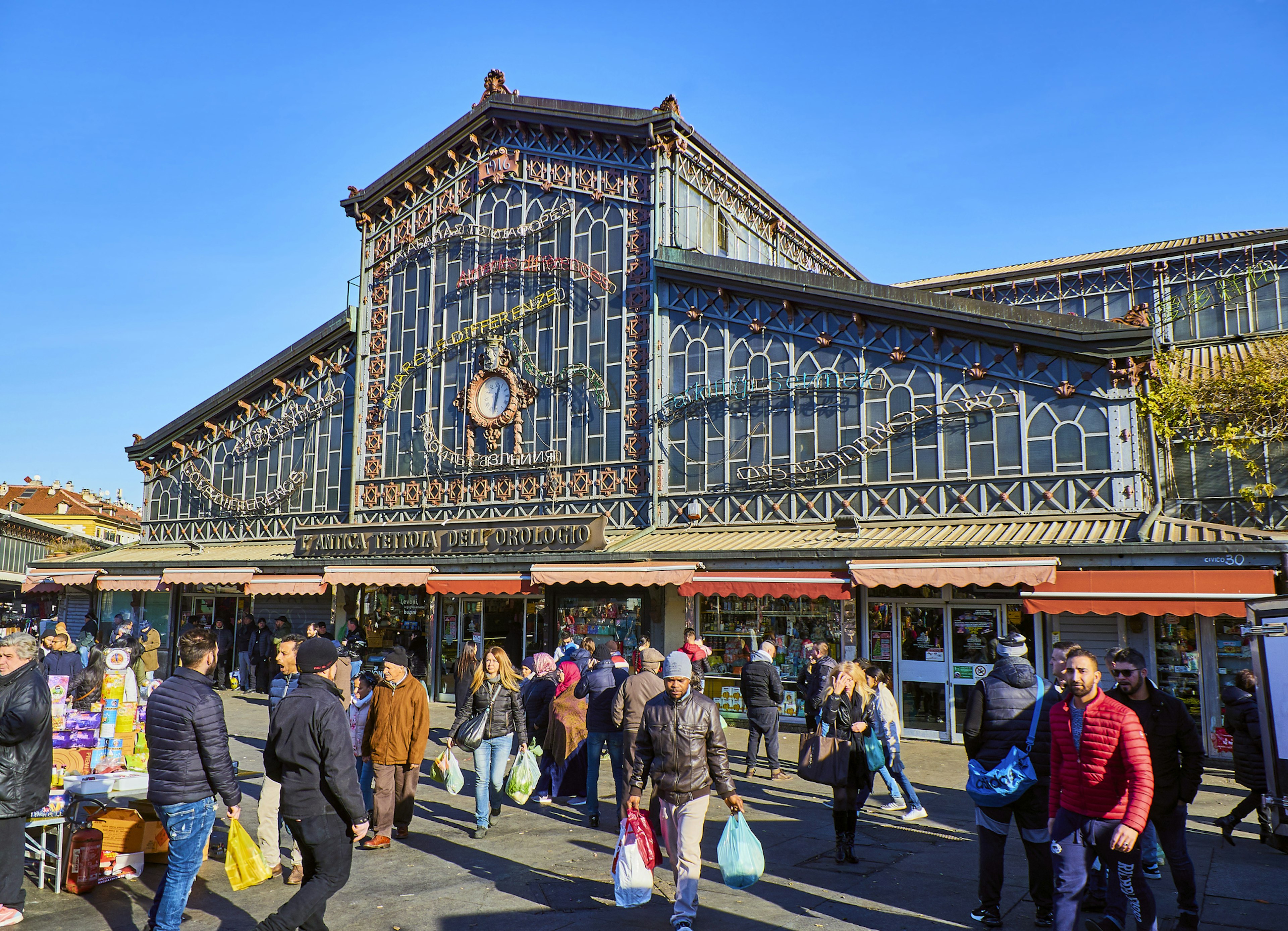 The antique clock canopy at Porta Palazzo market in Turin, Italy