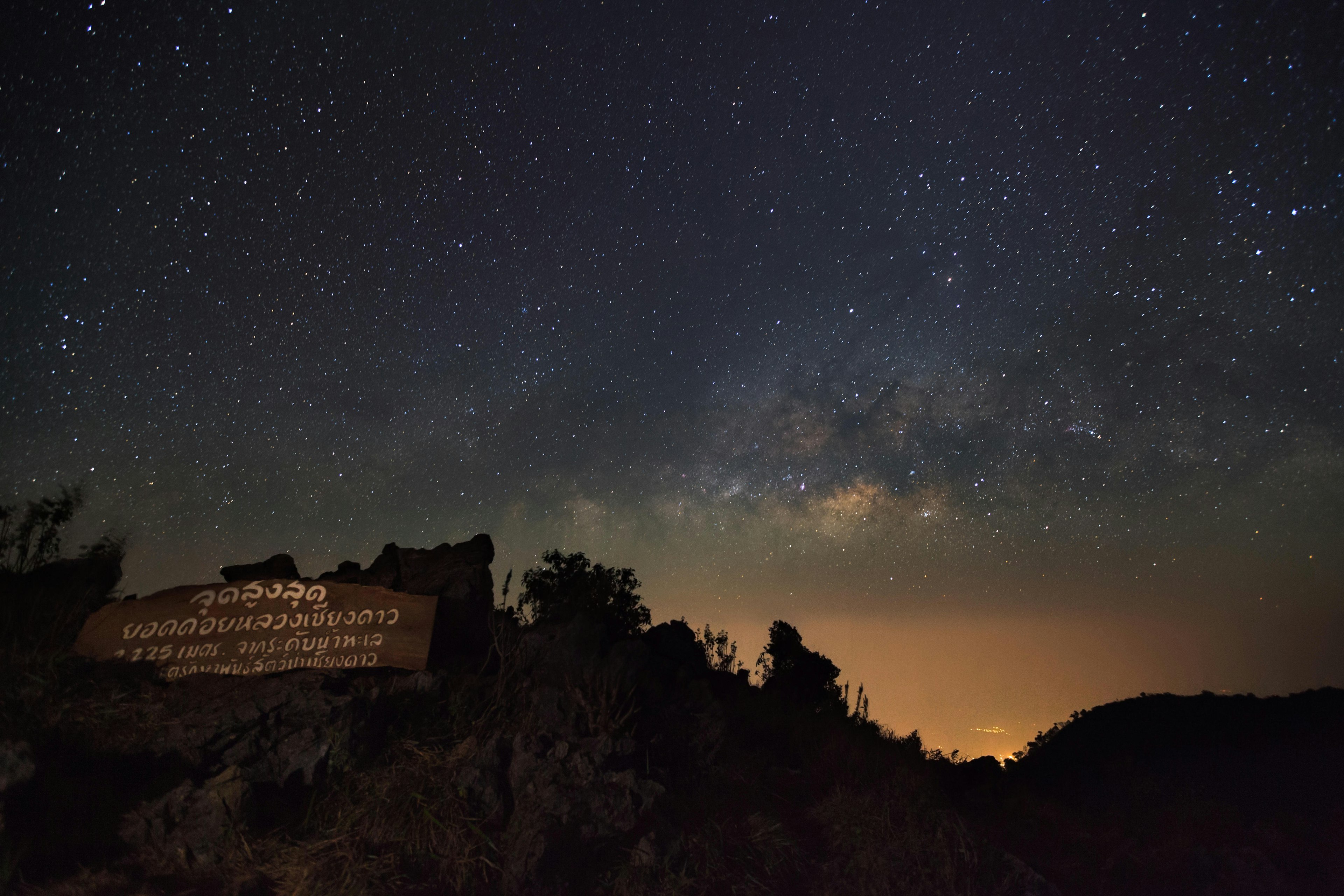 Doi Luang Chiang Dao, Chiang Mai - Febuary 13, 2016 : Milky Way Galaxy at Doi Luang Chiang Dao with Thai Language top point signs.