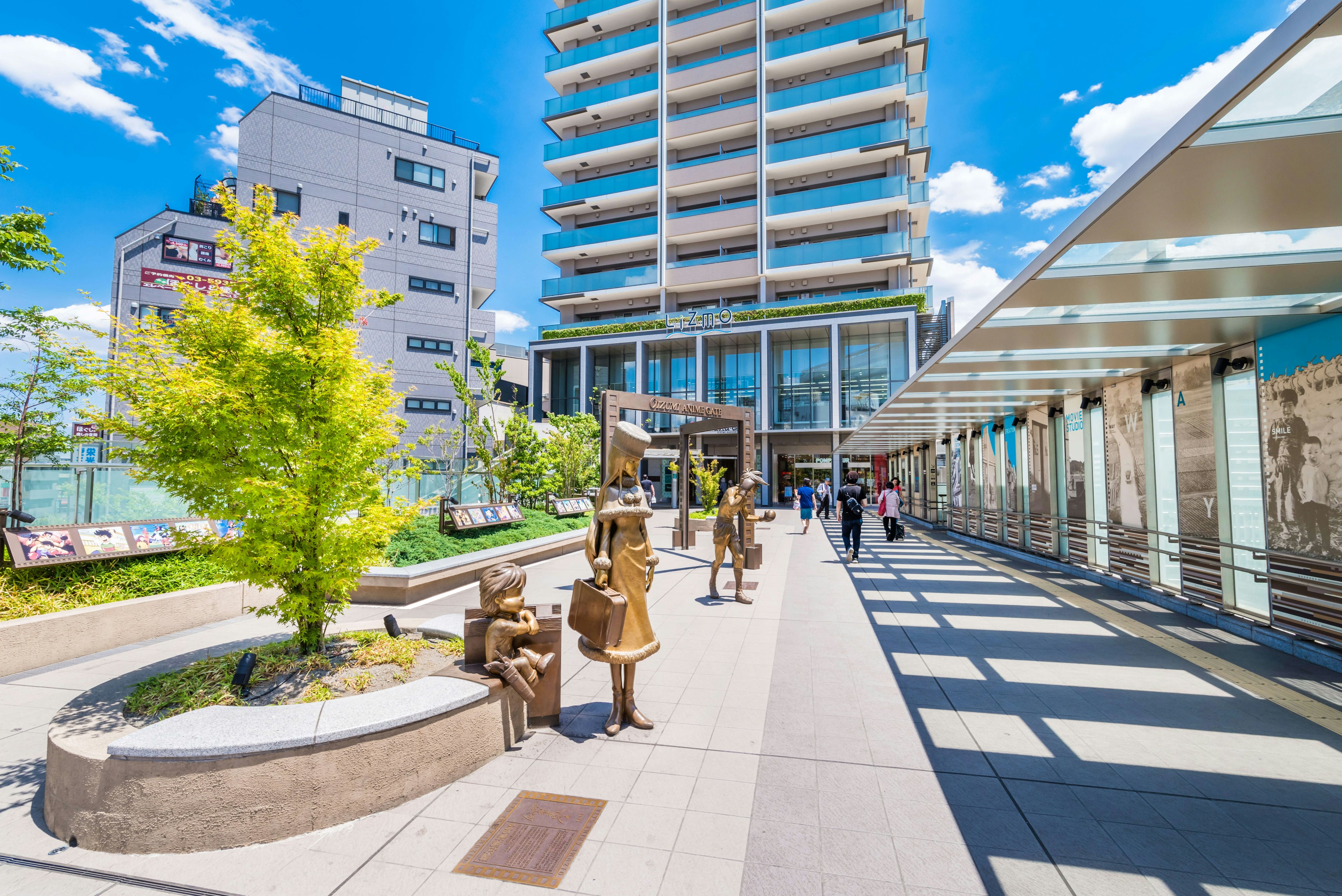 NERIMA, TOKYO / JAPAN - JUNE 5 2017 : "Oizumi Anime Gate" in front of "Oizumi Gakuen" station. A bronze statue of an animated work is displayed. "Oizumi" is the birthplace of Japanese animation.
city, building, urban, high rise, condo, housing, person, apartment building, office building, downtown, anime, Nerima, Tokyo, Oizumi Gakuen, gate