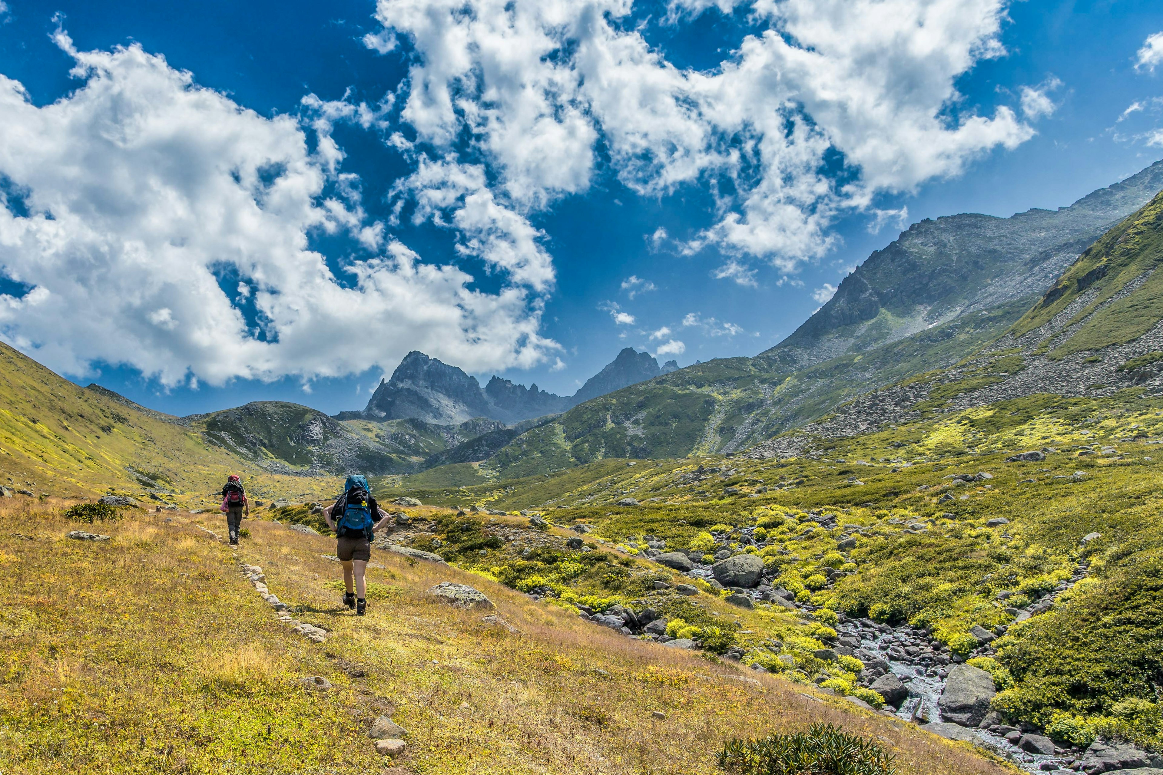 Hikers with large backpacks in the Kaçkar Mountains