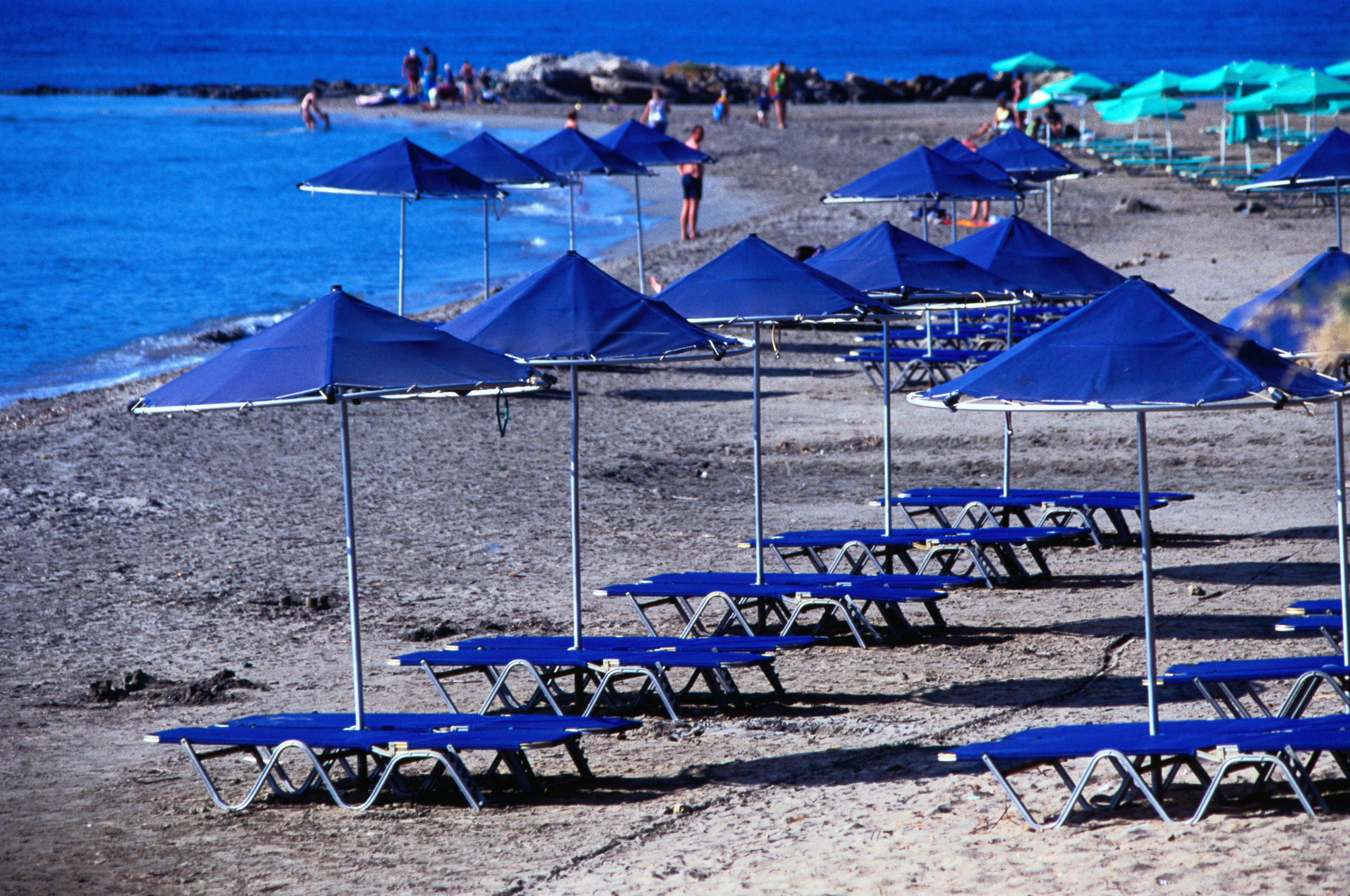 Sunloungers and parasols on a beach