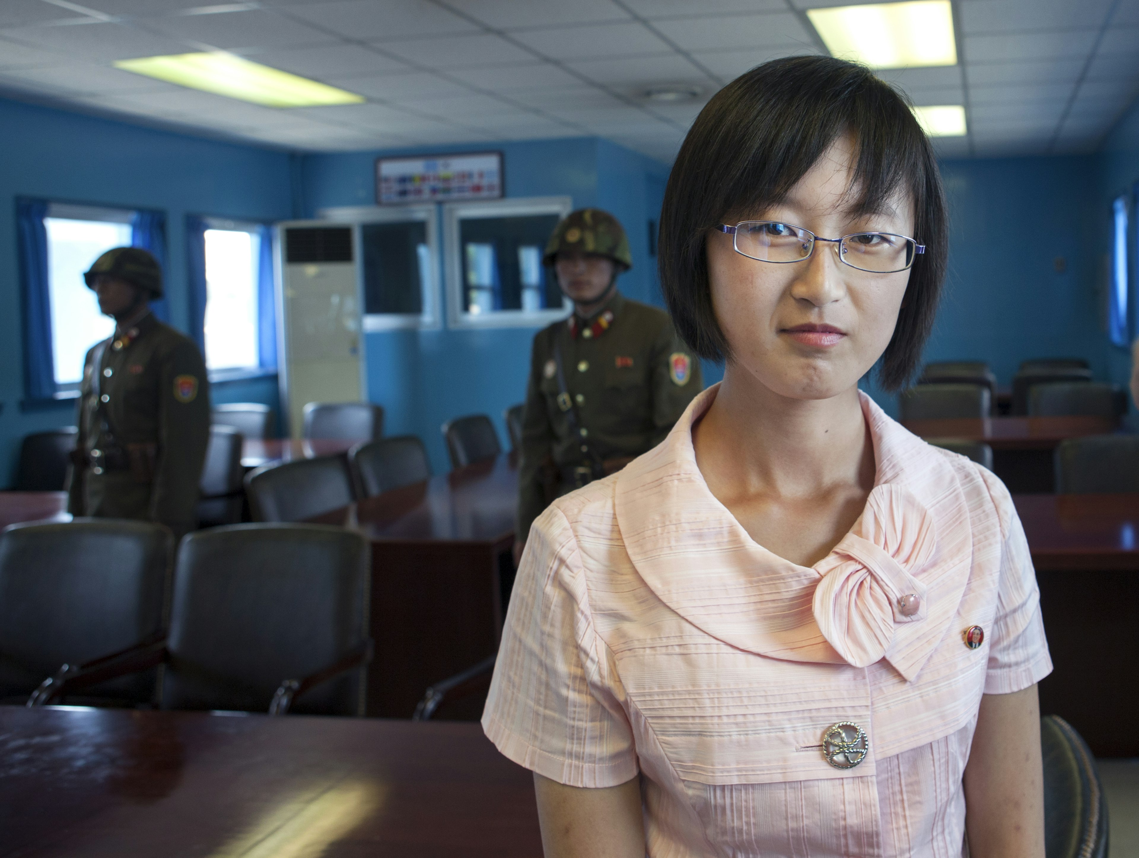 Woman visiting DMZ Joint Security Area between North and South Korea