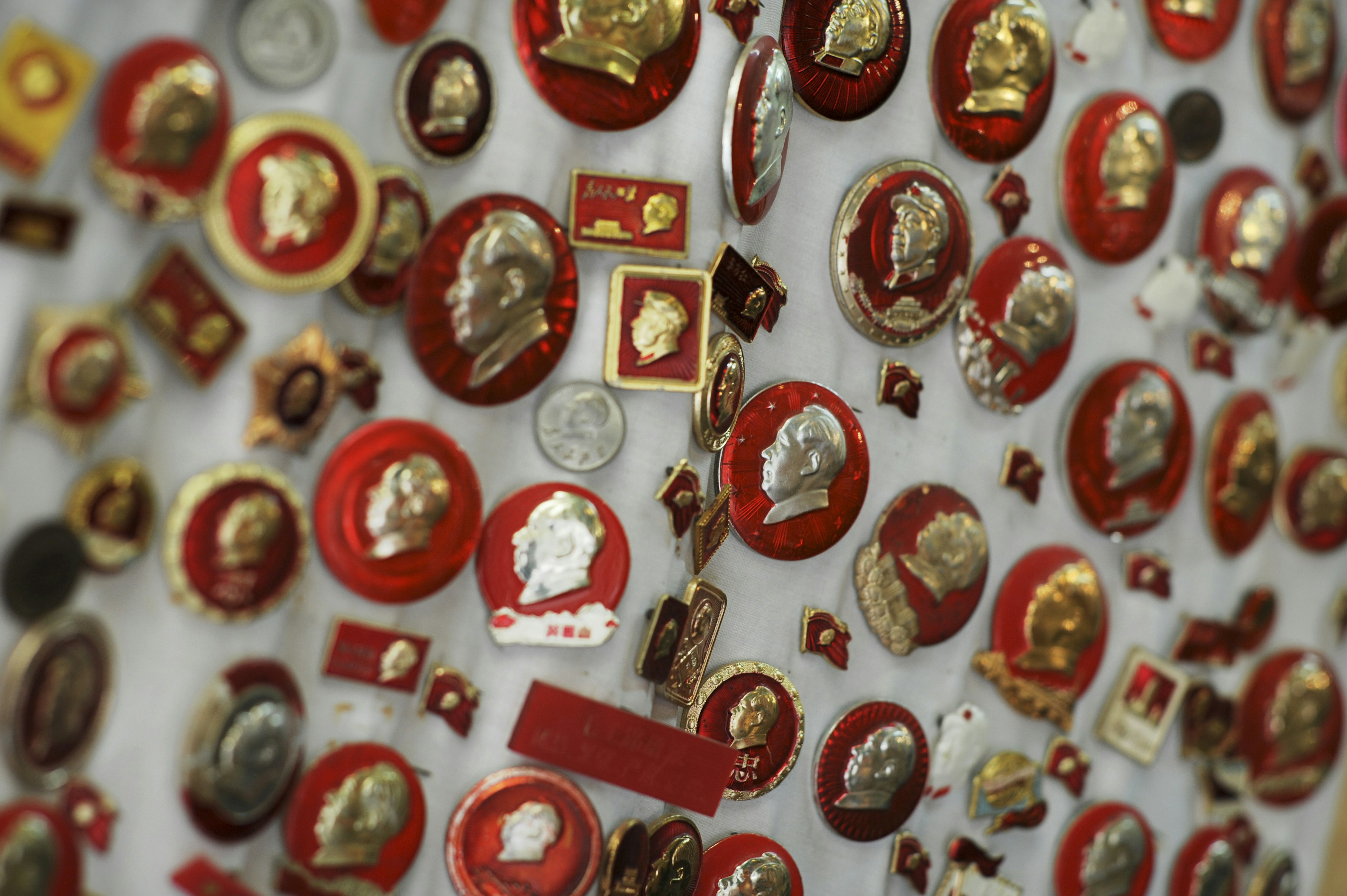 Cultural Revolution badges for sale at Cat Street market