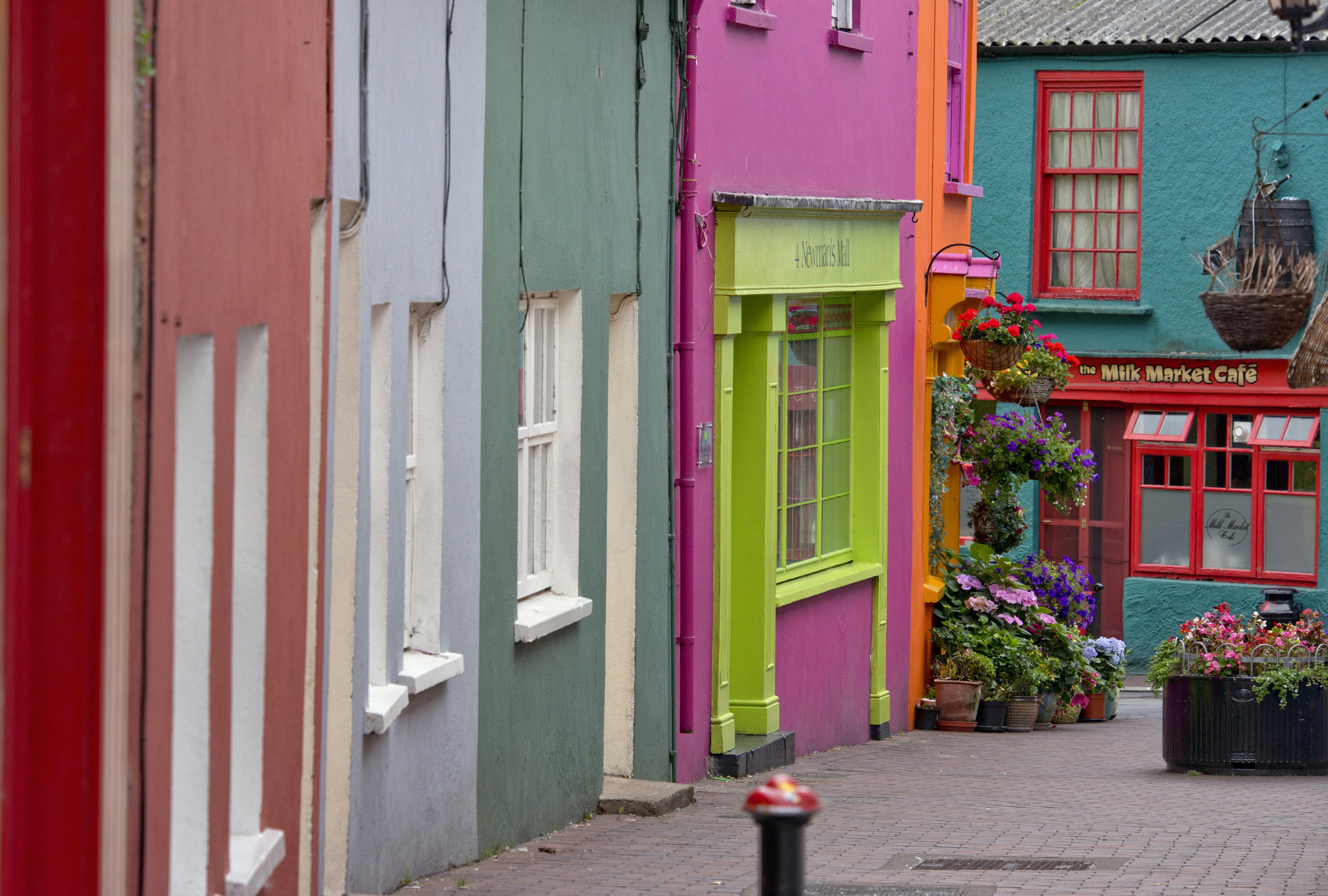 Brightly painted shopfronts near Market Square.