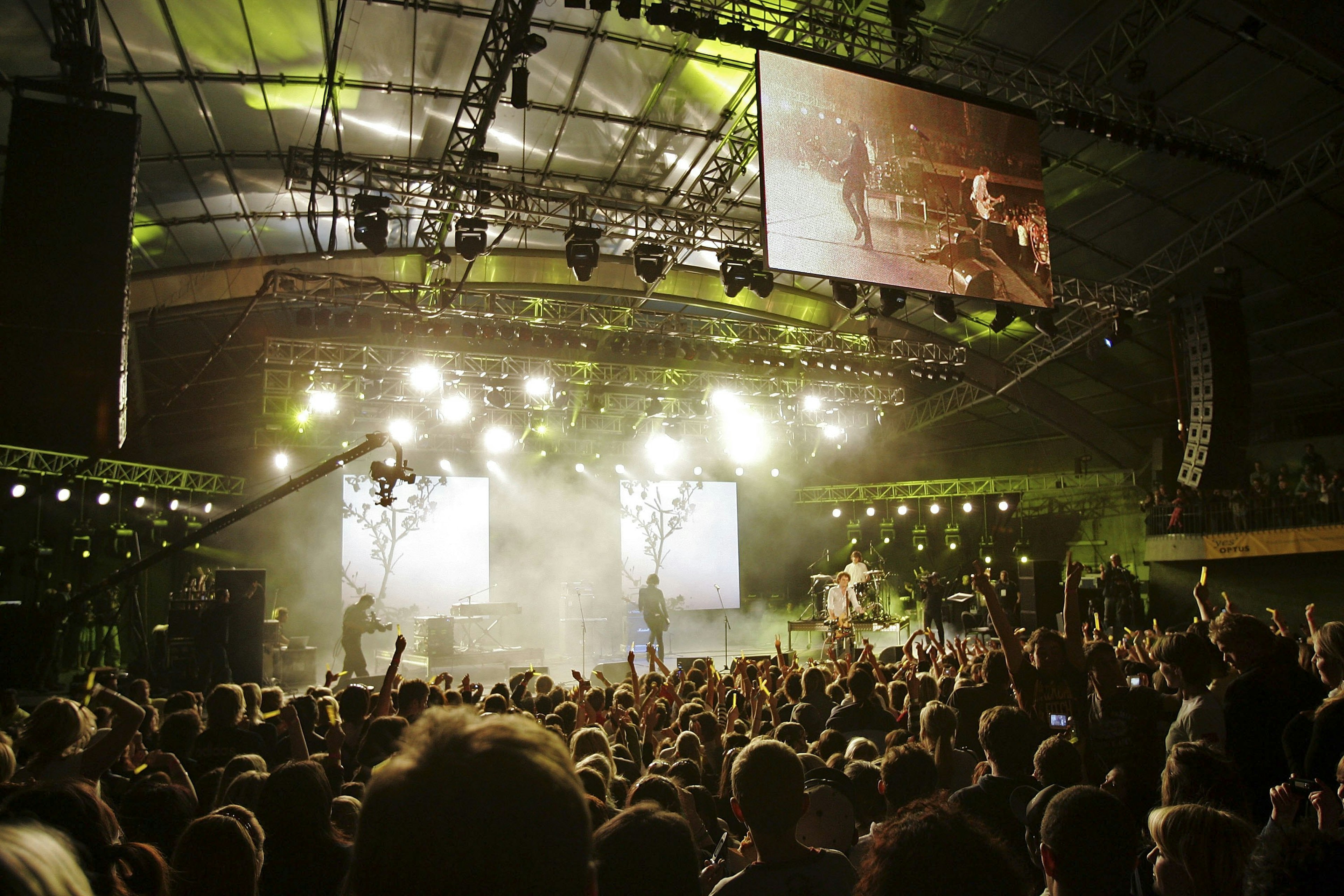 Evermore perform on stage at the Make Poverty History concert at the Sidney Myer Music Bowl November 17, 2006 in Melbourne, Australia. The band are up on stage with a huge crowd around them.