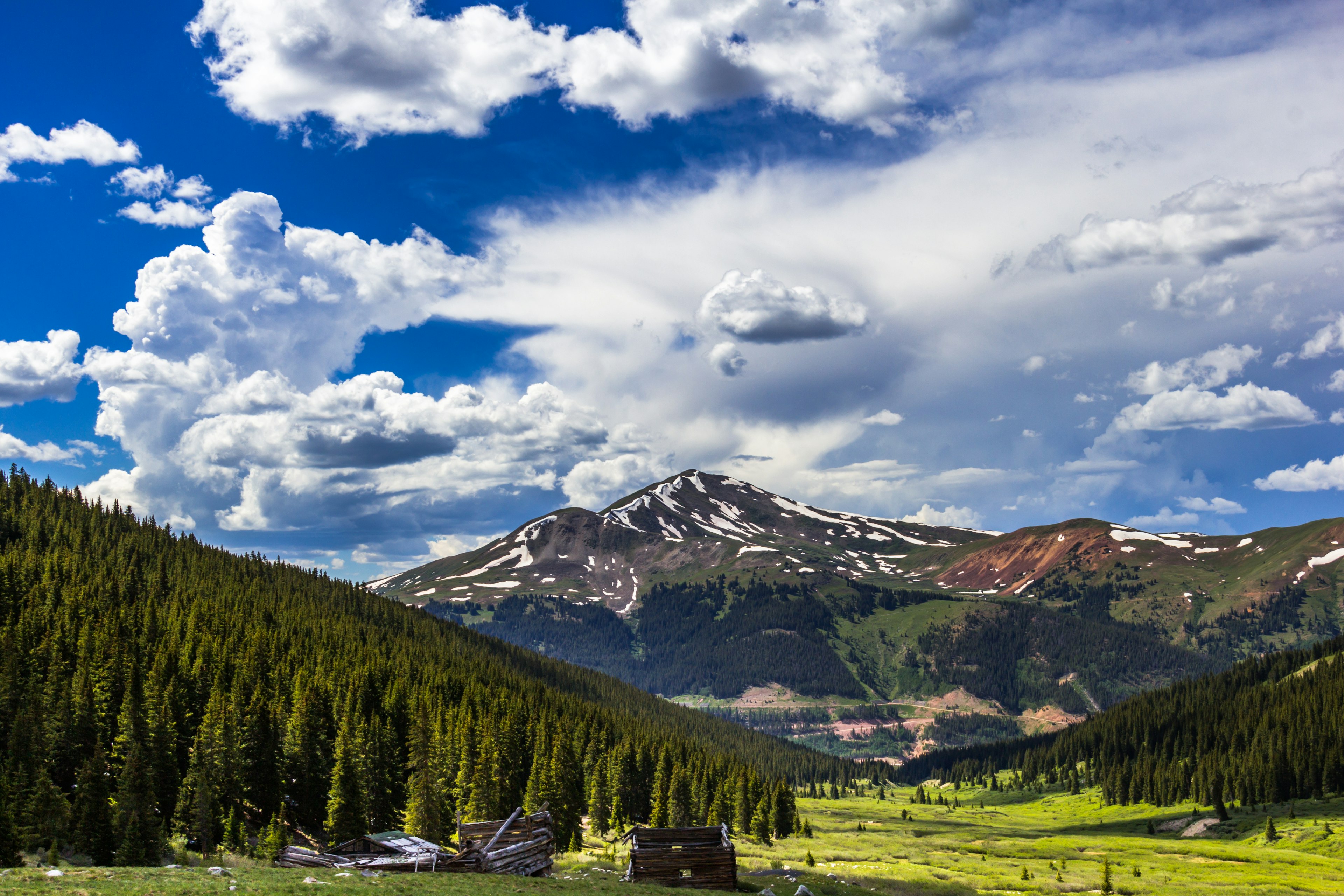 Mayflower Gulch with snow capped mountains