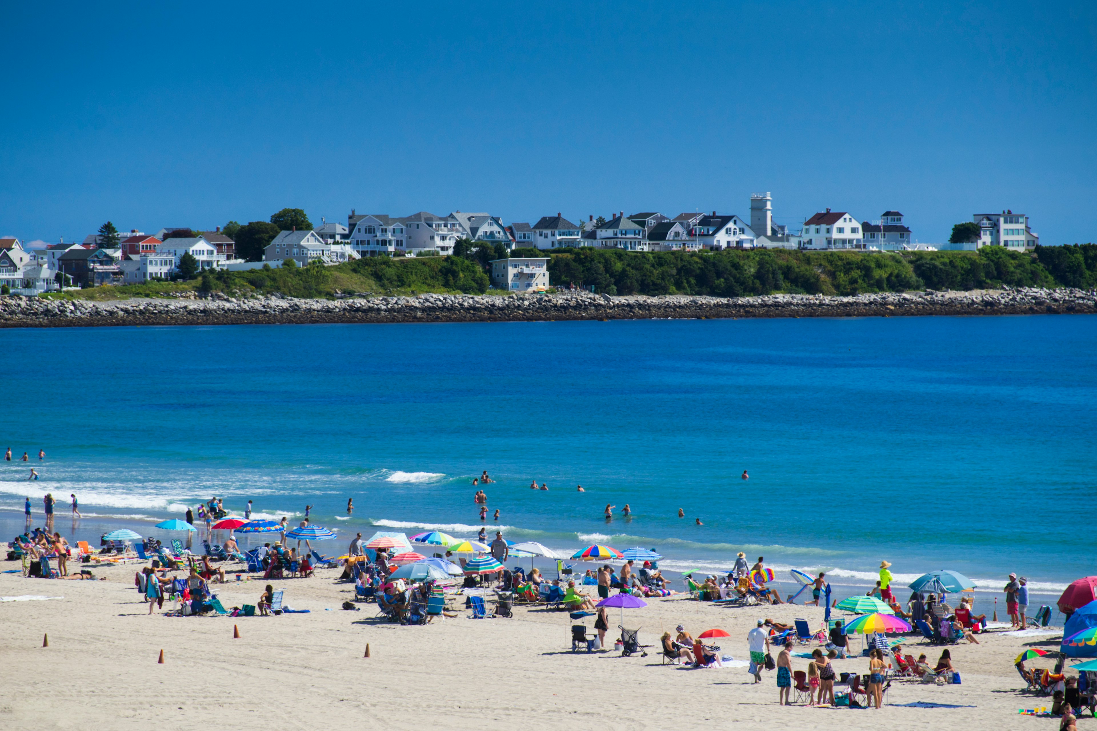 People sunbathing on Hampton Beach in New Hampshire