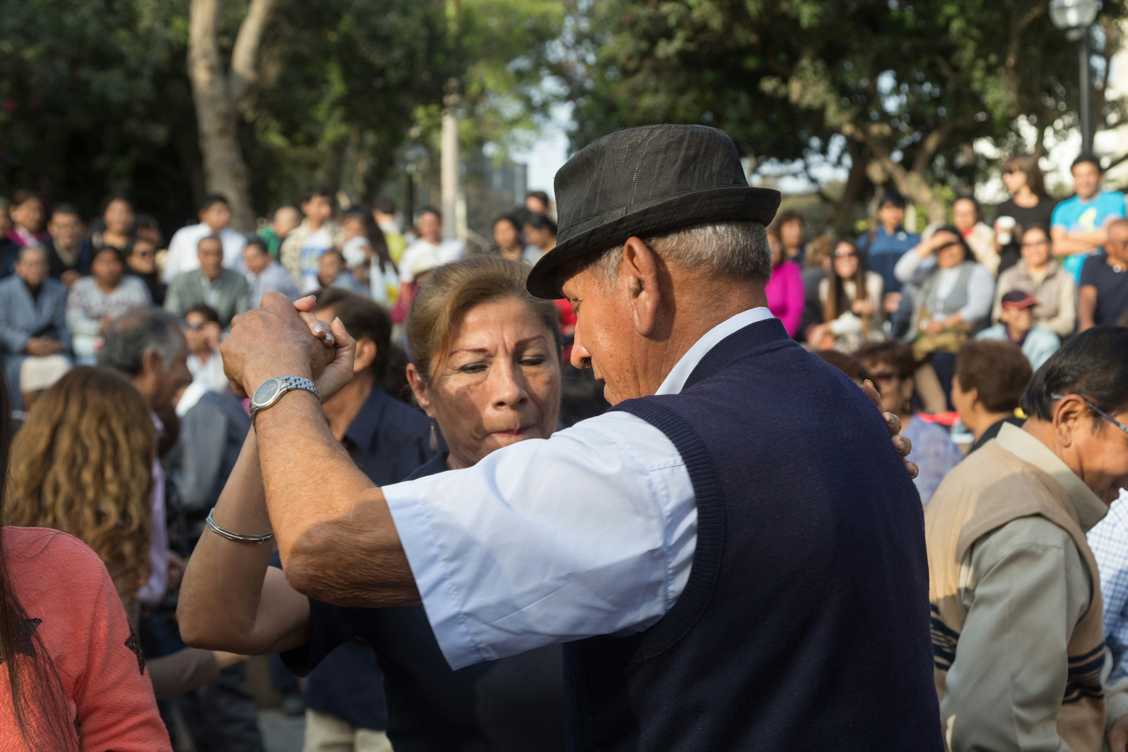 People at the public Saturday Salsa dancing event in Parque Kennedy in Miraflores district.