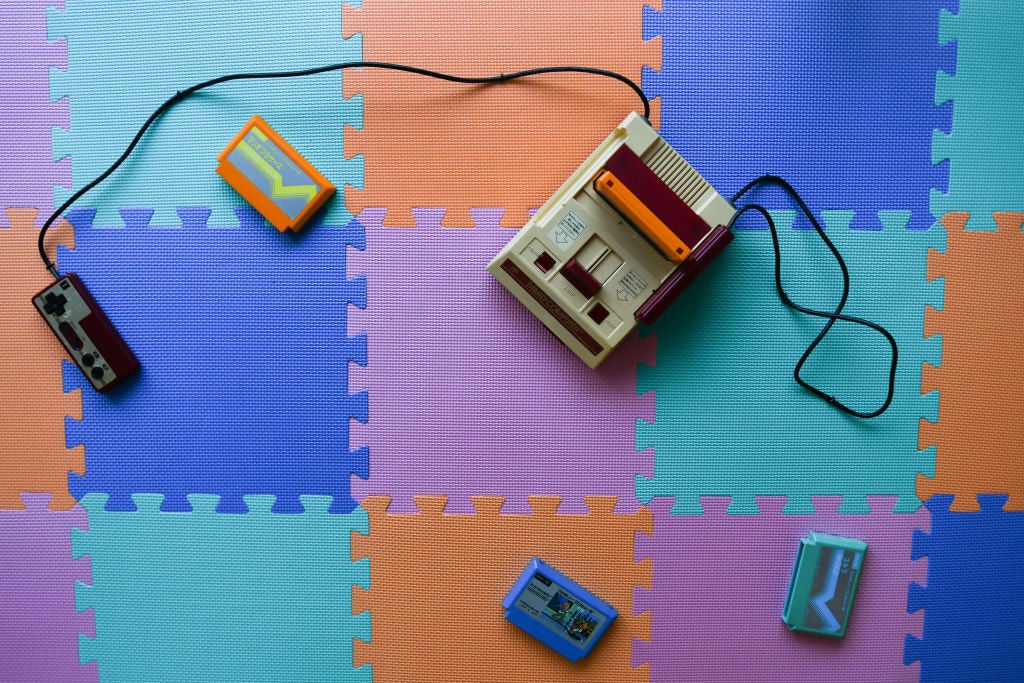 Video game consoles on the ceiling of 84