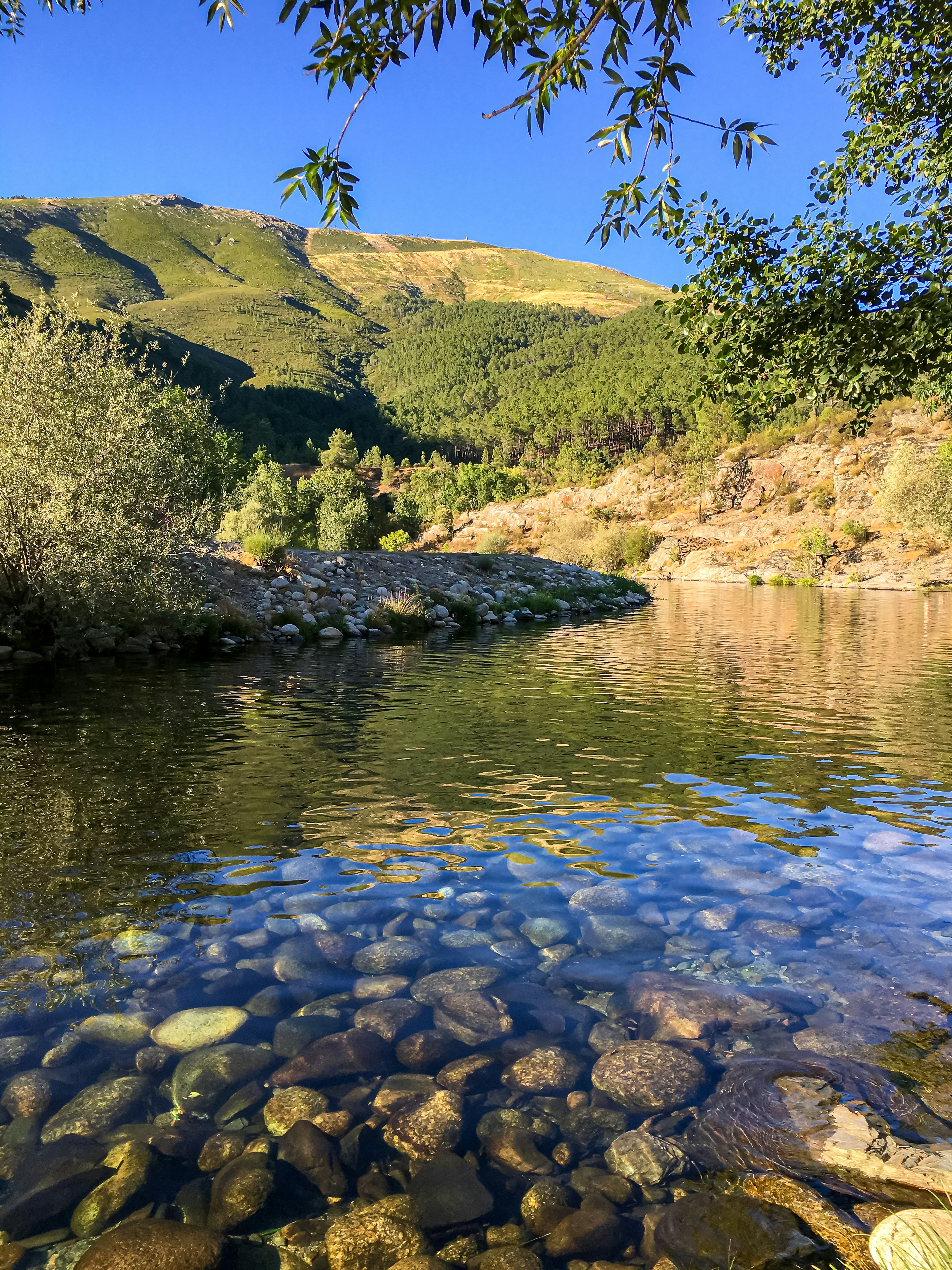 Pond with clear refreshing water on the river Zezere in the Serra da Estrela at Manteigas, Portugal