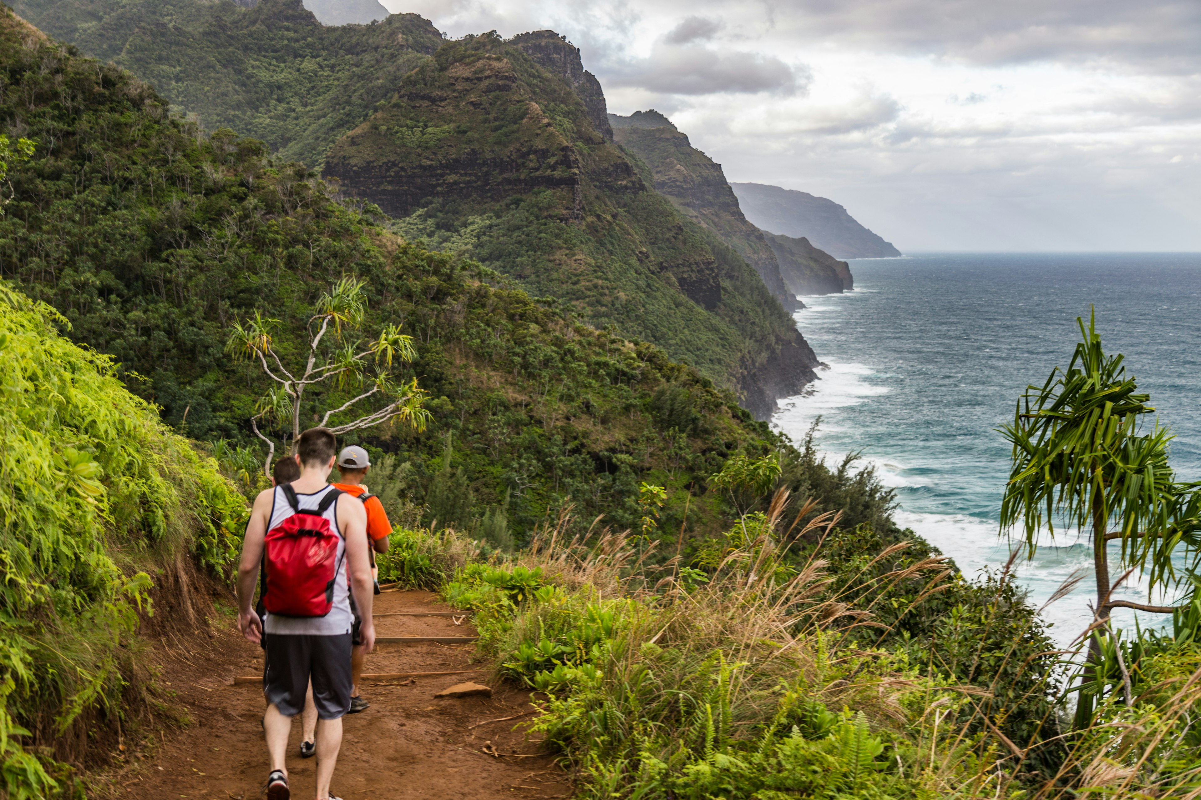 Hikers on the Kalalau Trail on the Na Pali Coast of Kauai