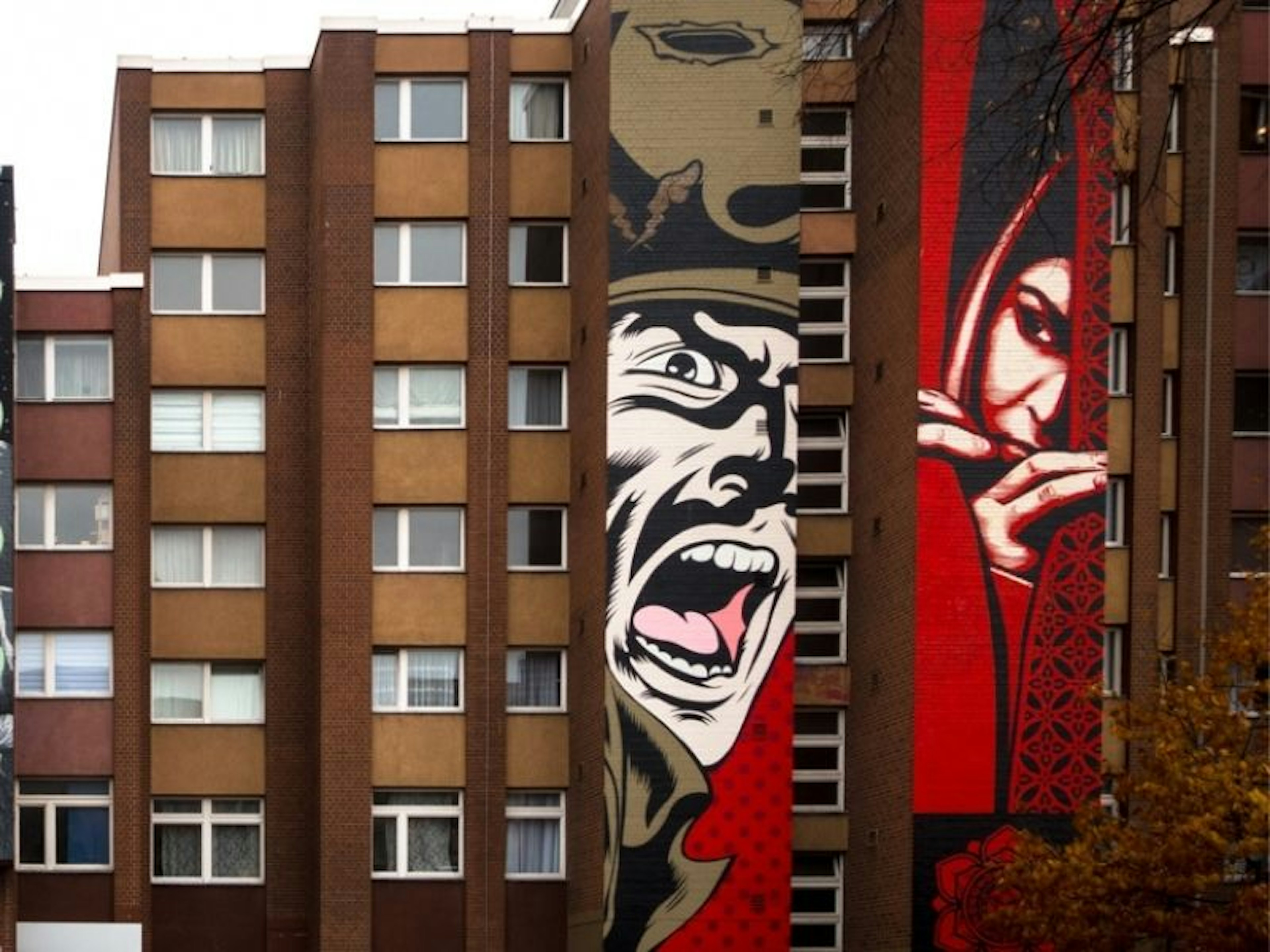 Two artworks by Shepard Fairey along Bülowstrasse in Berlin