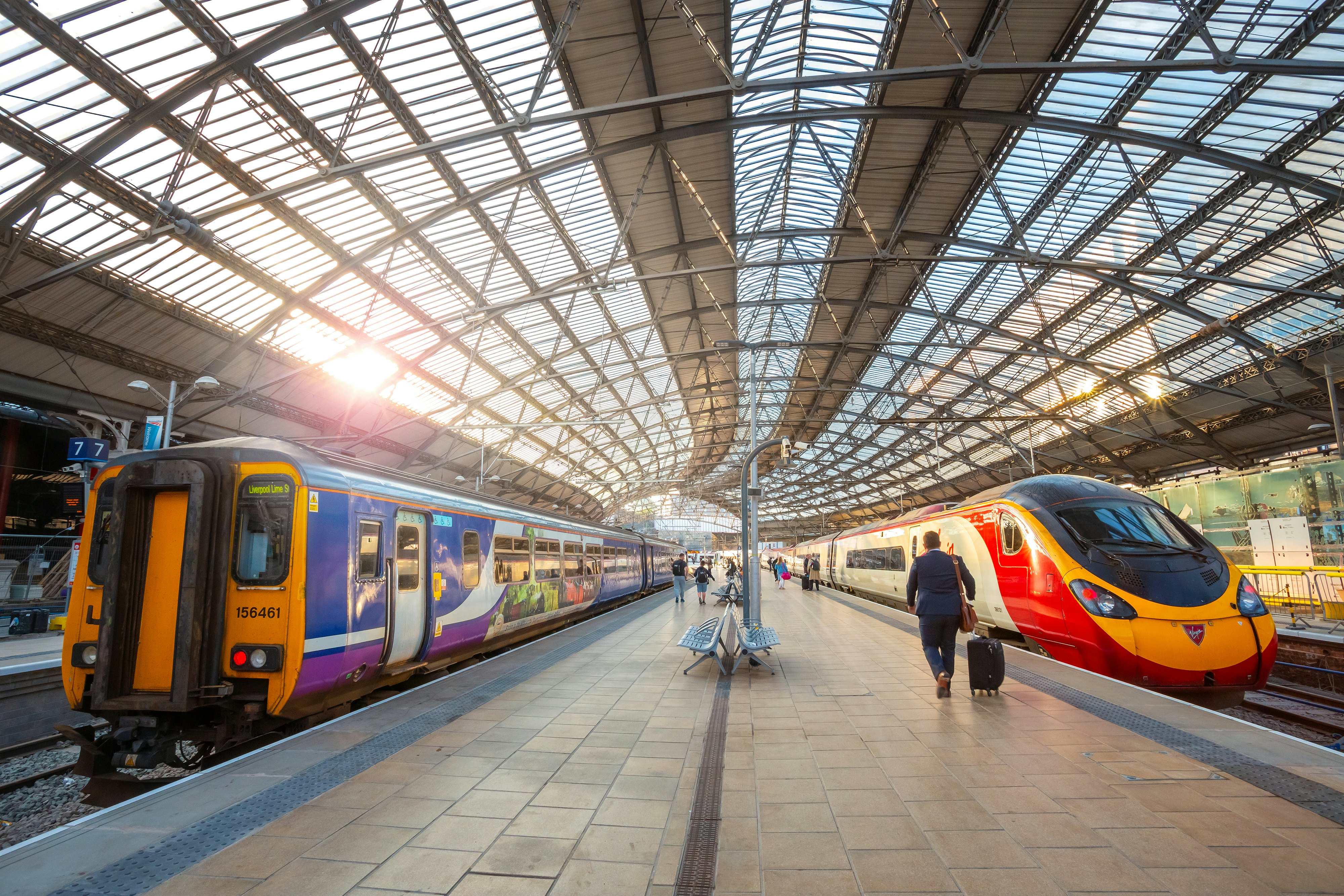 Two trains wait on platforms at Liverpool Lime Street terminus in Liverpool