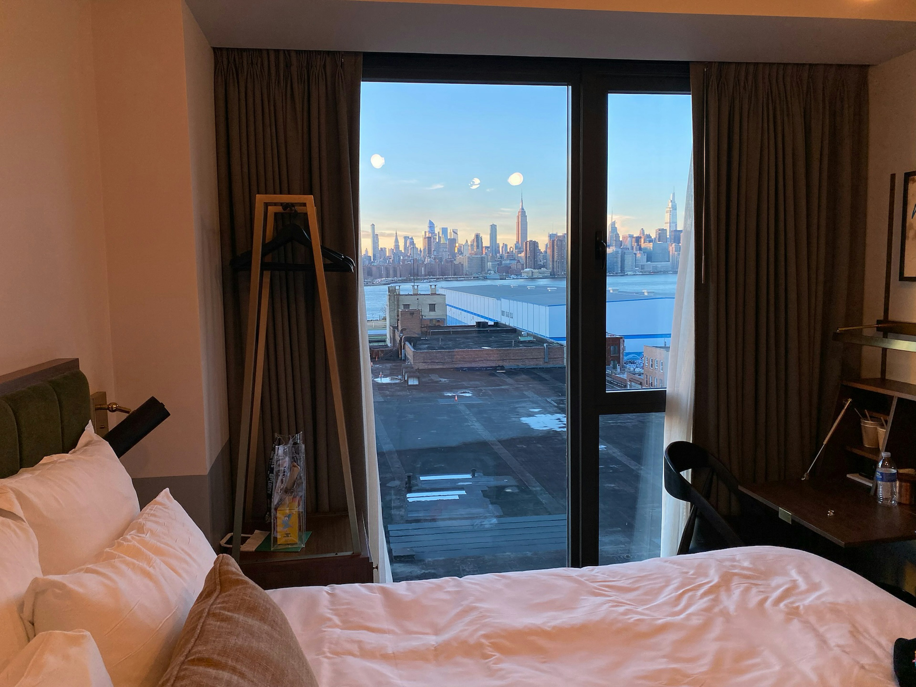 the Manhattan skyline view from a room at The Hoxton