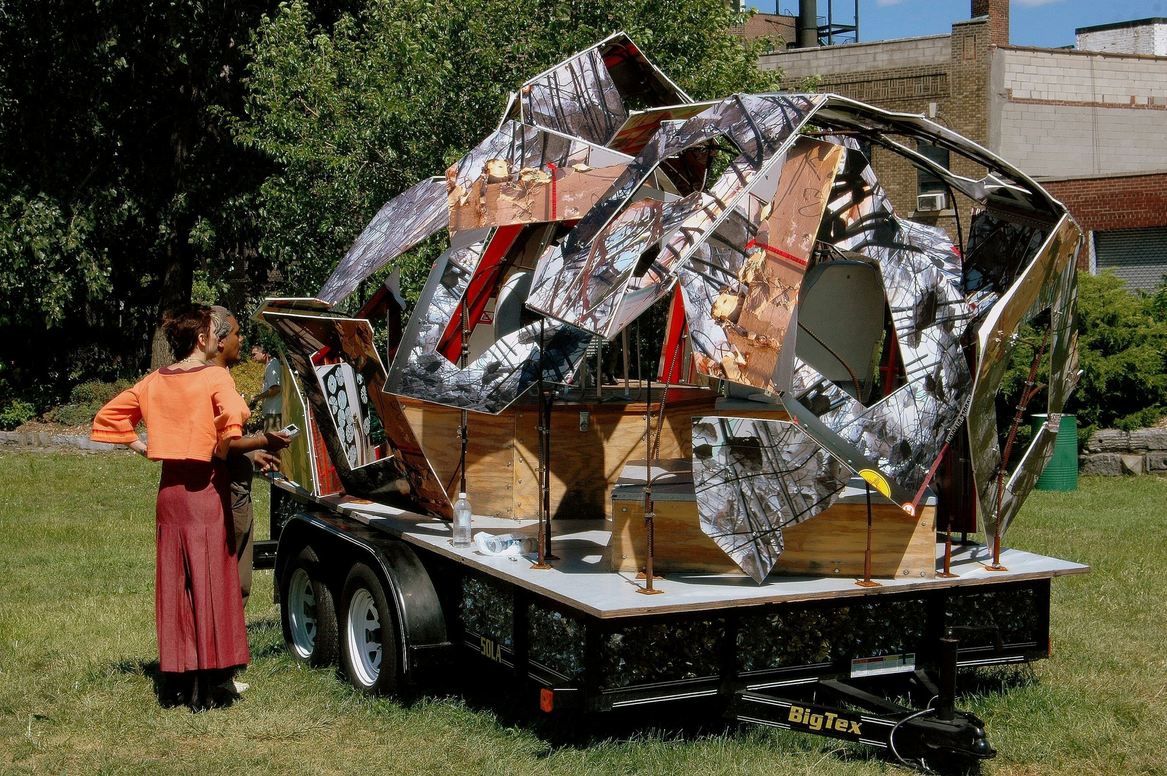 A couple views a contemporary art installation at Socrates Sculpture Park in Astoria, Queens, New York City, New York, USA