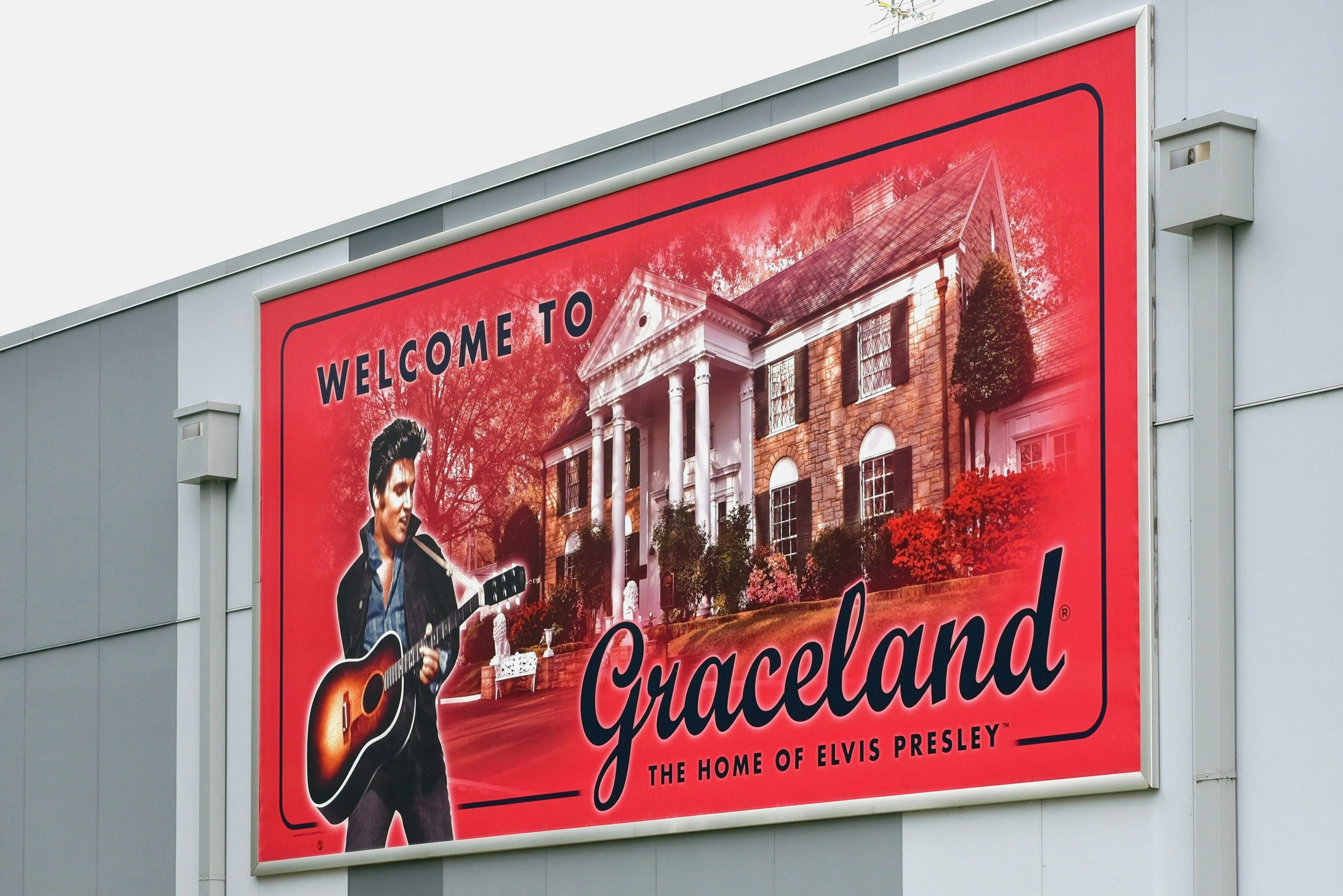 rance to the Graceland complex featuring sign of Elvis