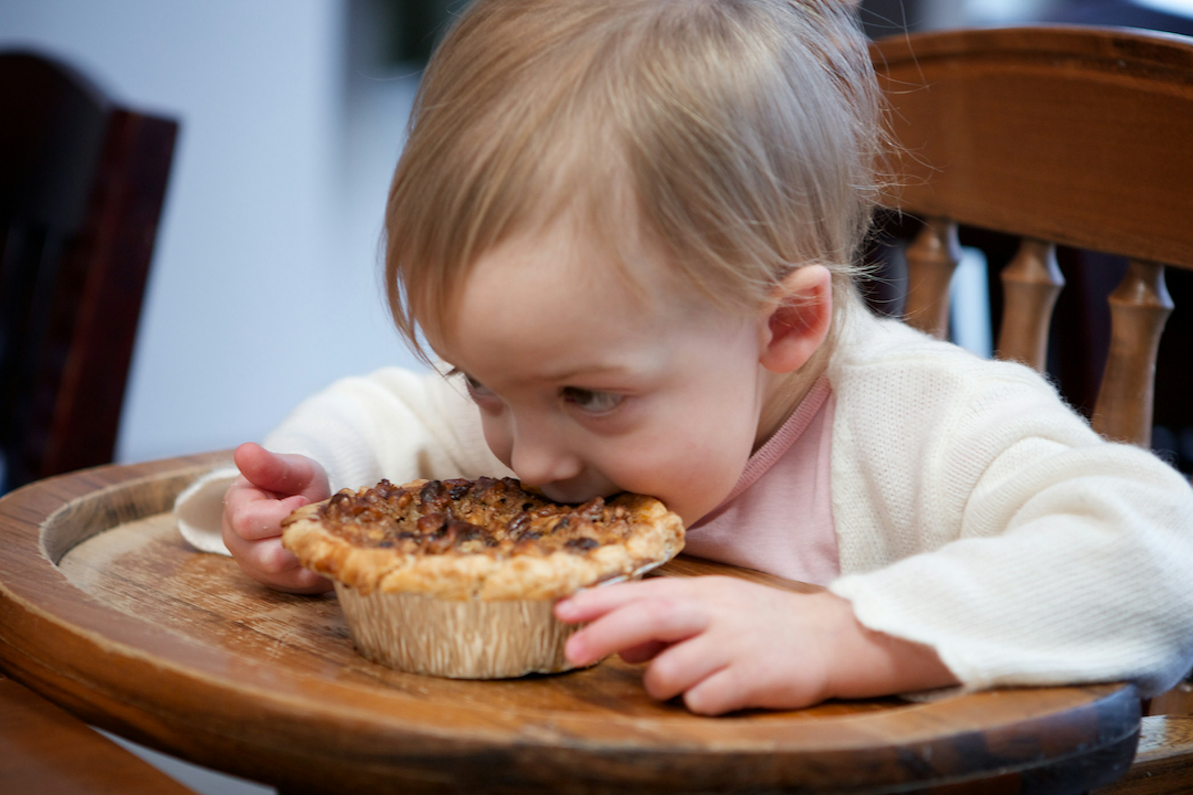 A young guest enjoys Blue Sky Bakery's chocolate pecan pie. © Robert August Olding