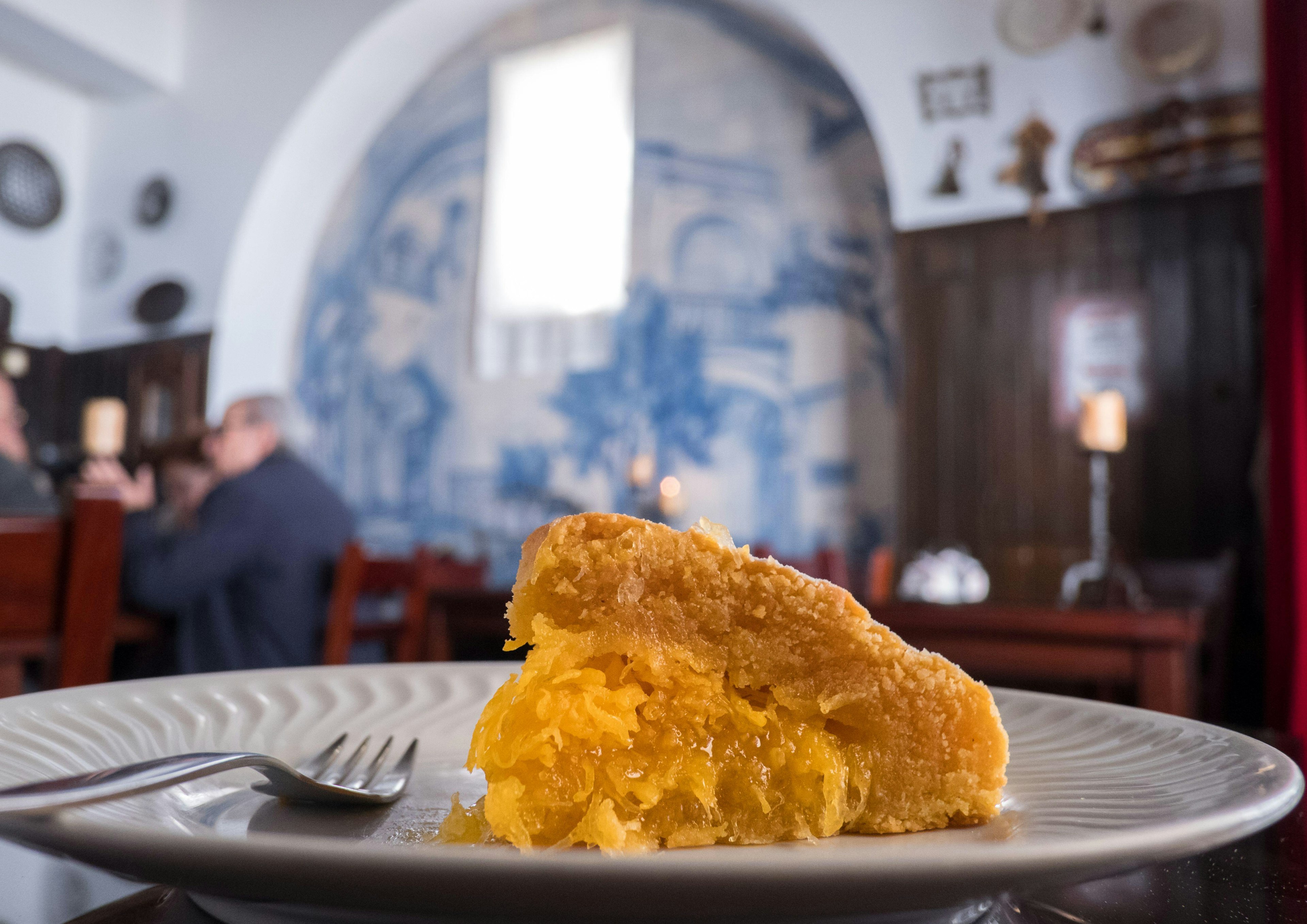 Pão de Rala, a pumpkin-filled pastry on a beautiful palte.