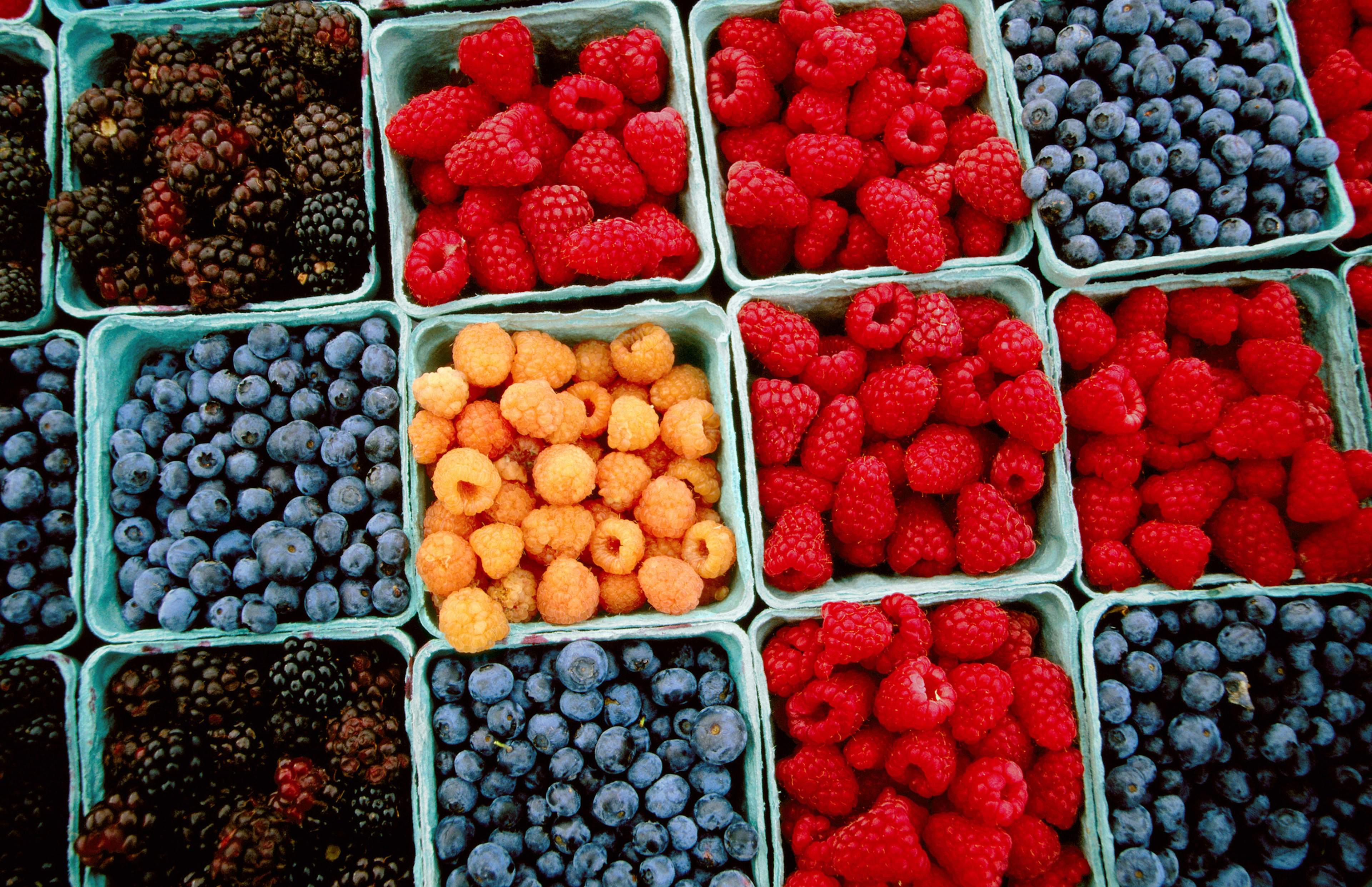 Raspberry, blueberry and blackberry punnets at Farmers Market.