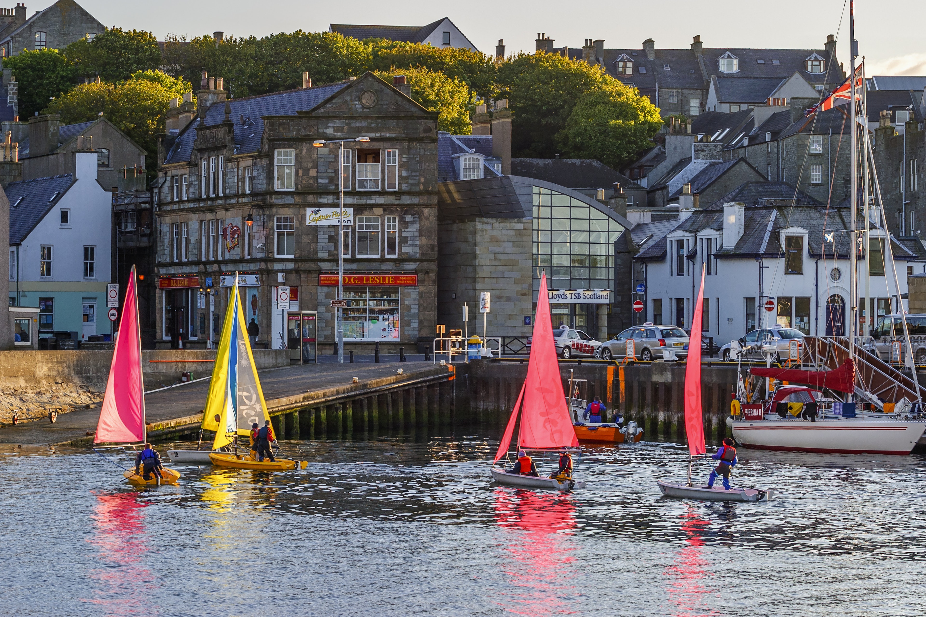 Sailboats in the harbor at the city of Lerwick in Shetland