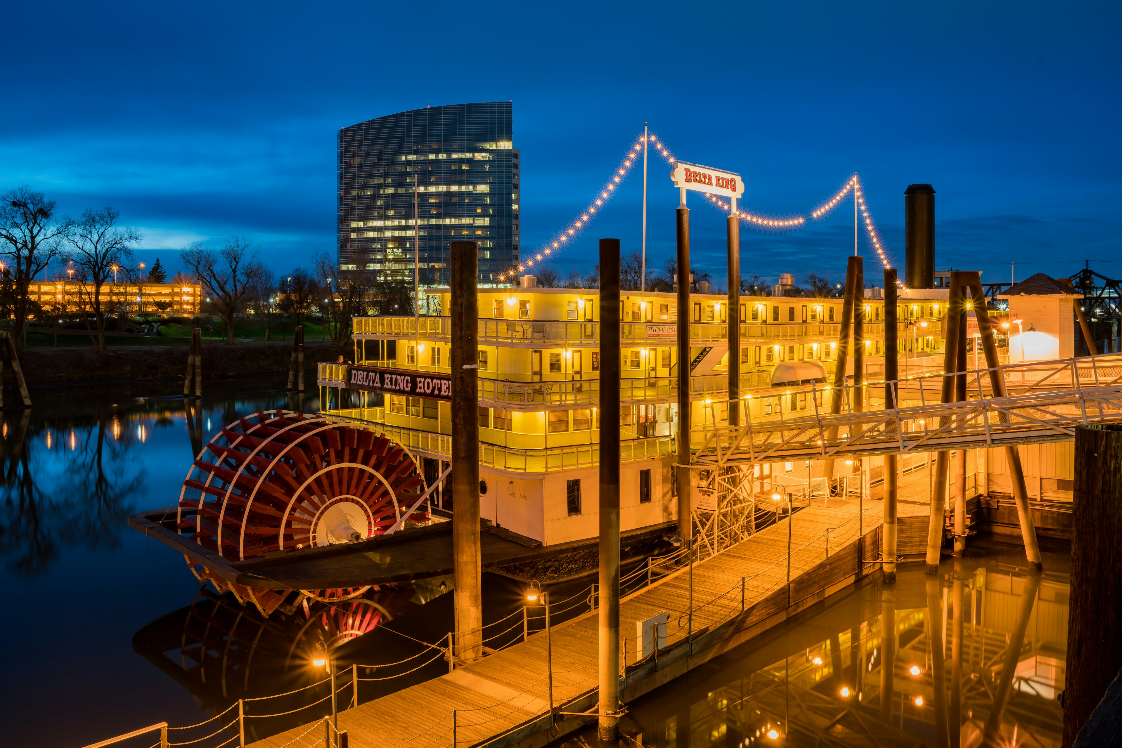 The permanently moored Delta King steamboat by night, now a hotel in Downtown Sacramento, California, USA