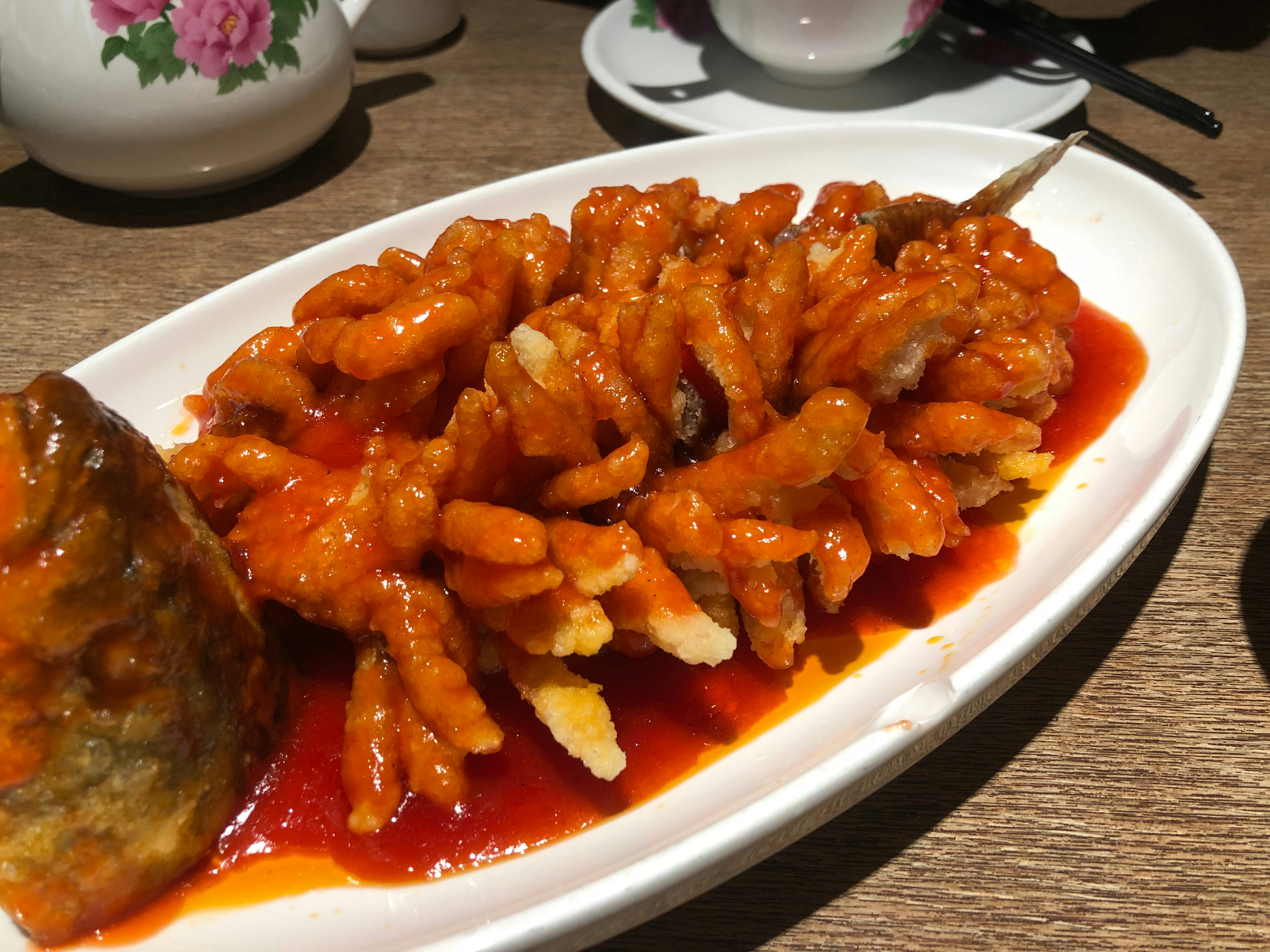 Nanjing China sweet and sour squirrel tail fish Chris Ng shutterstock_1382161229 RFC.jpg