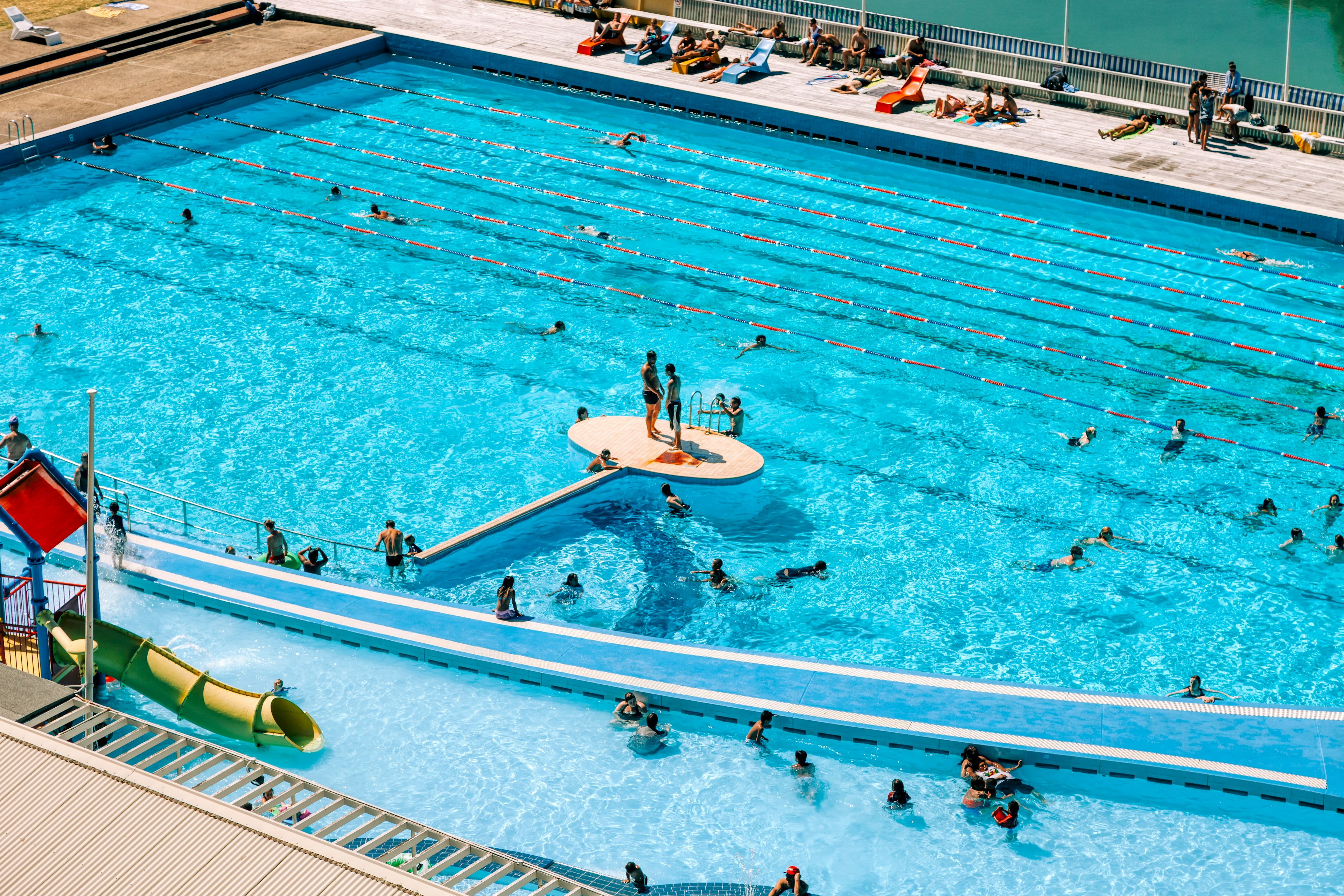 Swimmers and people on a platform at the Parnell Baths in Auckland, New Zealand