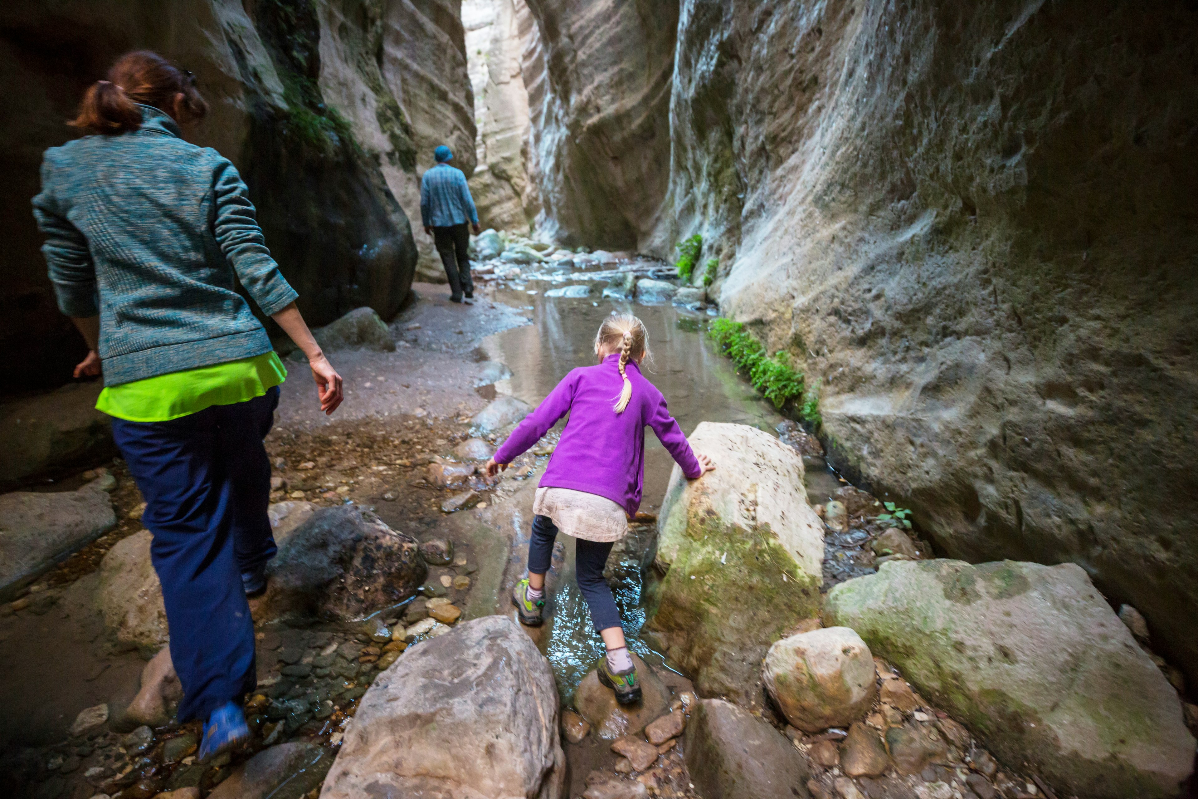 Family hiking through in Avakas Gorge near Paphos