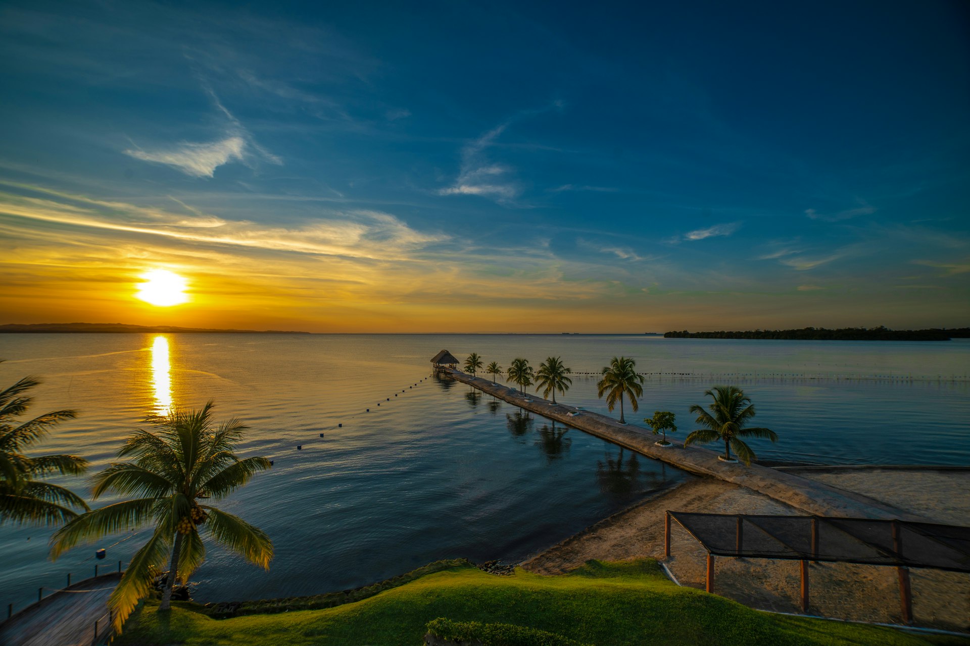 Sunset over the shore at Amatique Bay, Puerto Barrios, Guatemala. 