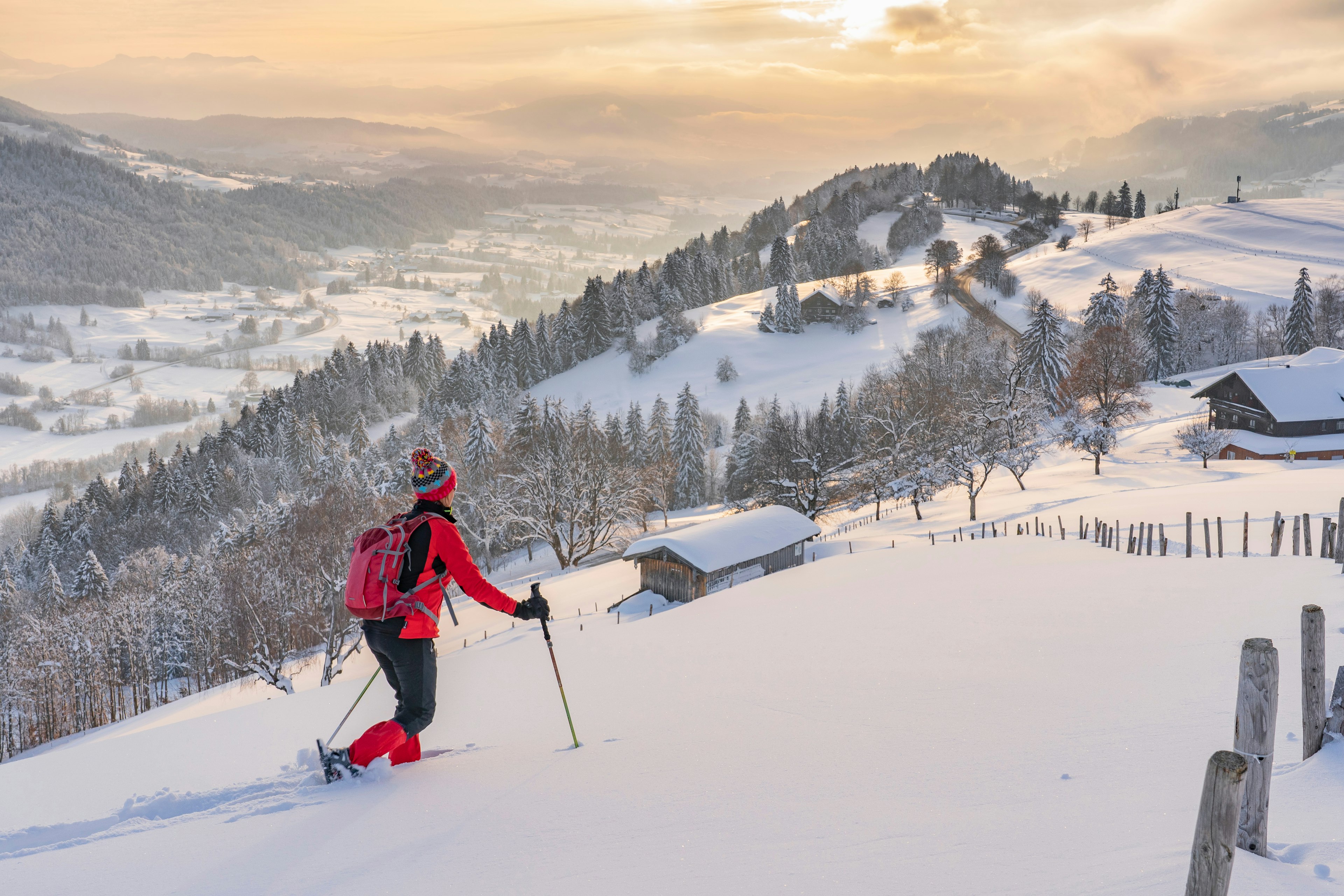 Woman snowshoeing in the Allgaeu Alps near Oberstaufen, Austria