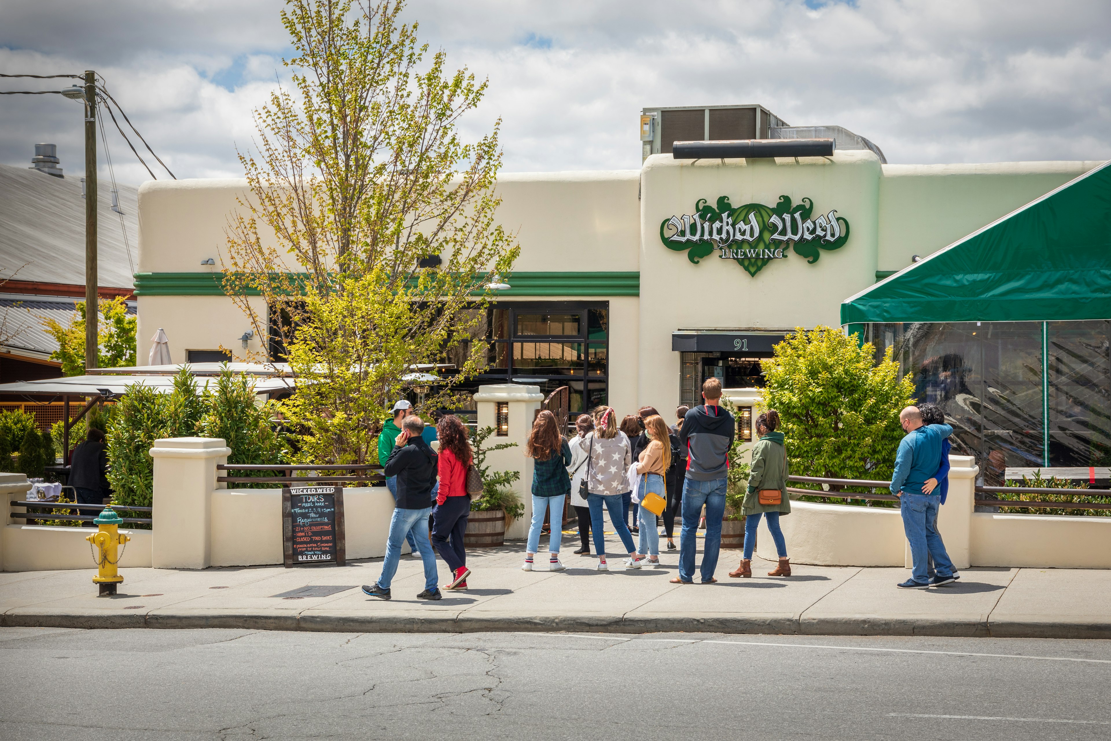 A line forms at The Wicked Weed Brewing Co. on Biltmore Ave