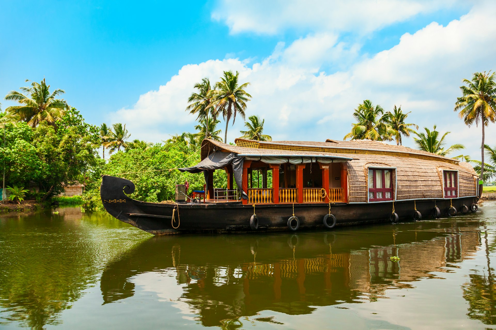 A houseboat sailing in the backwaters near Alappuzha in Kerala in India.