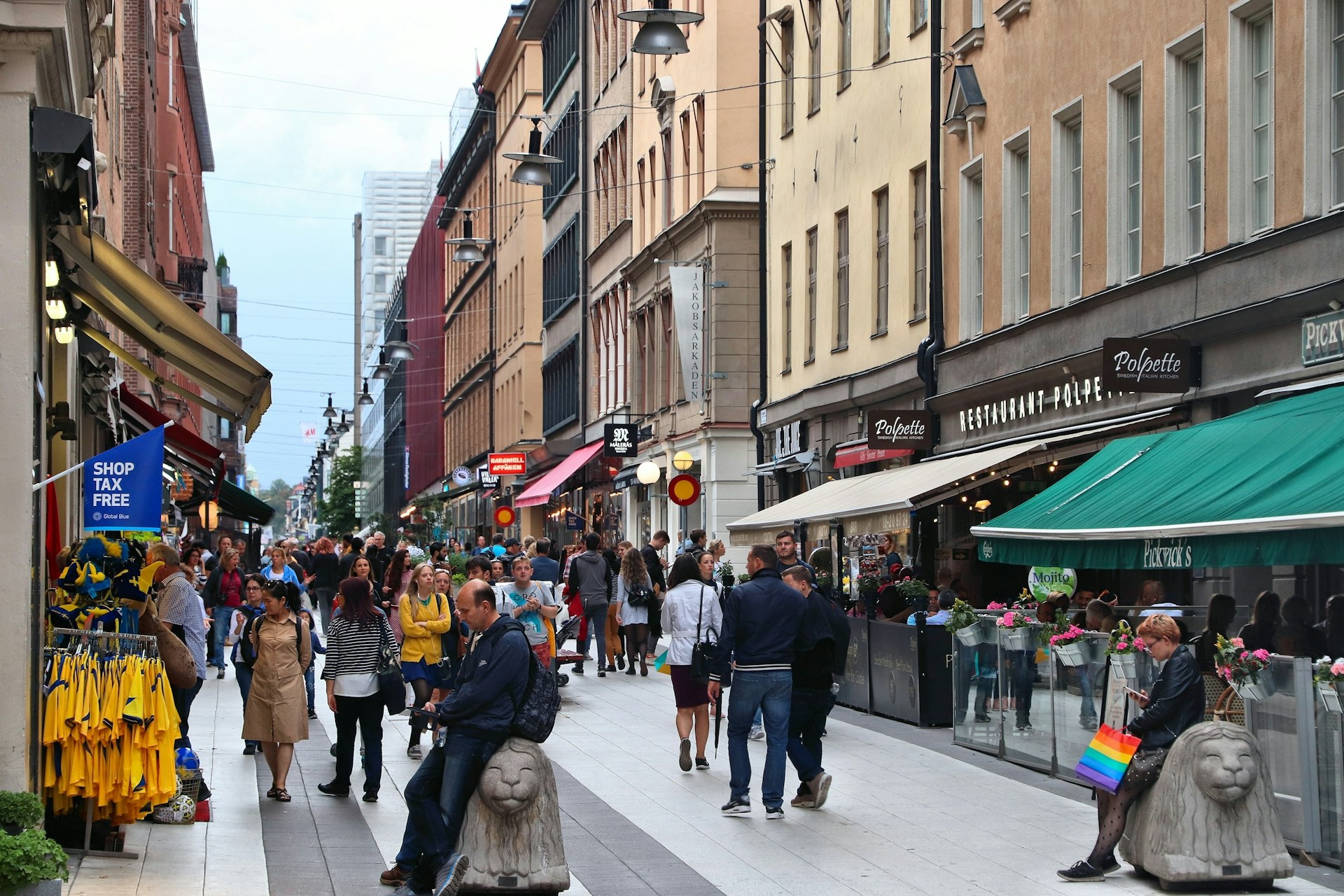 People visit Drottninggatan shopping street in Norrmalm district, Stockholm, Sweden