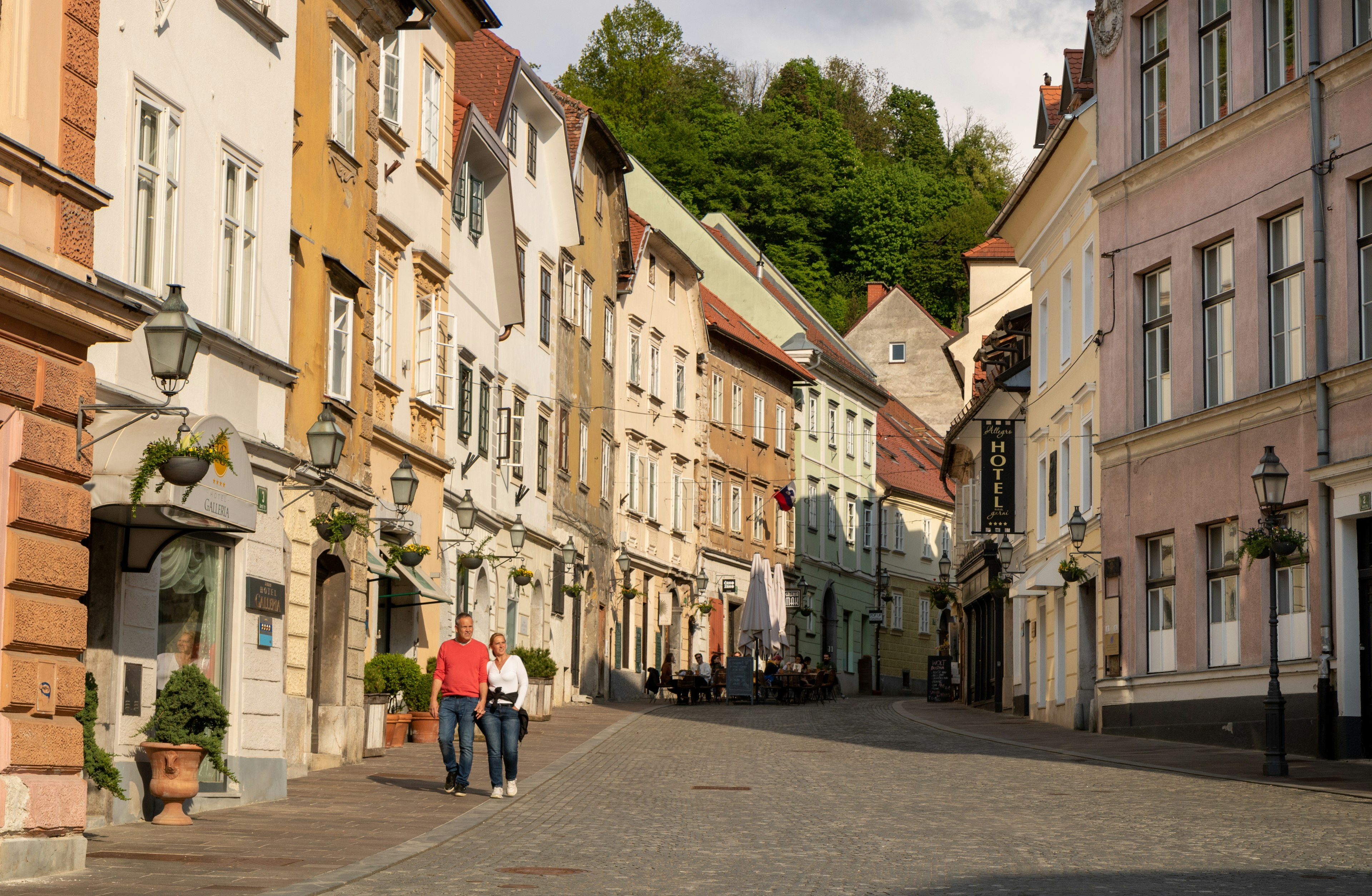 People walking between Gornji trg and Levstikov trg in the historic centre