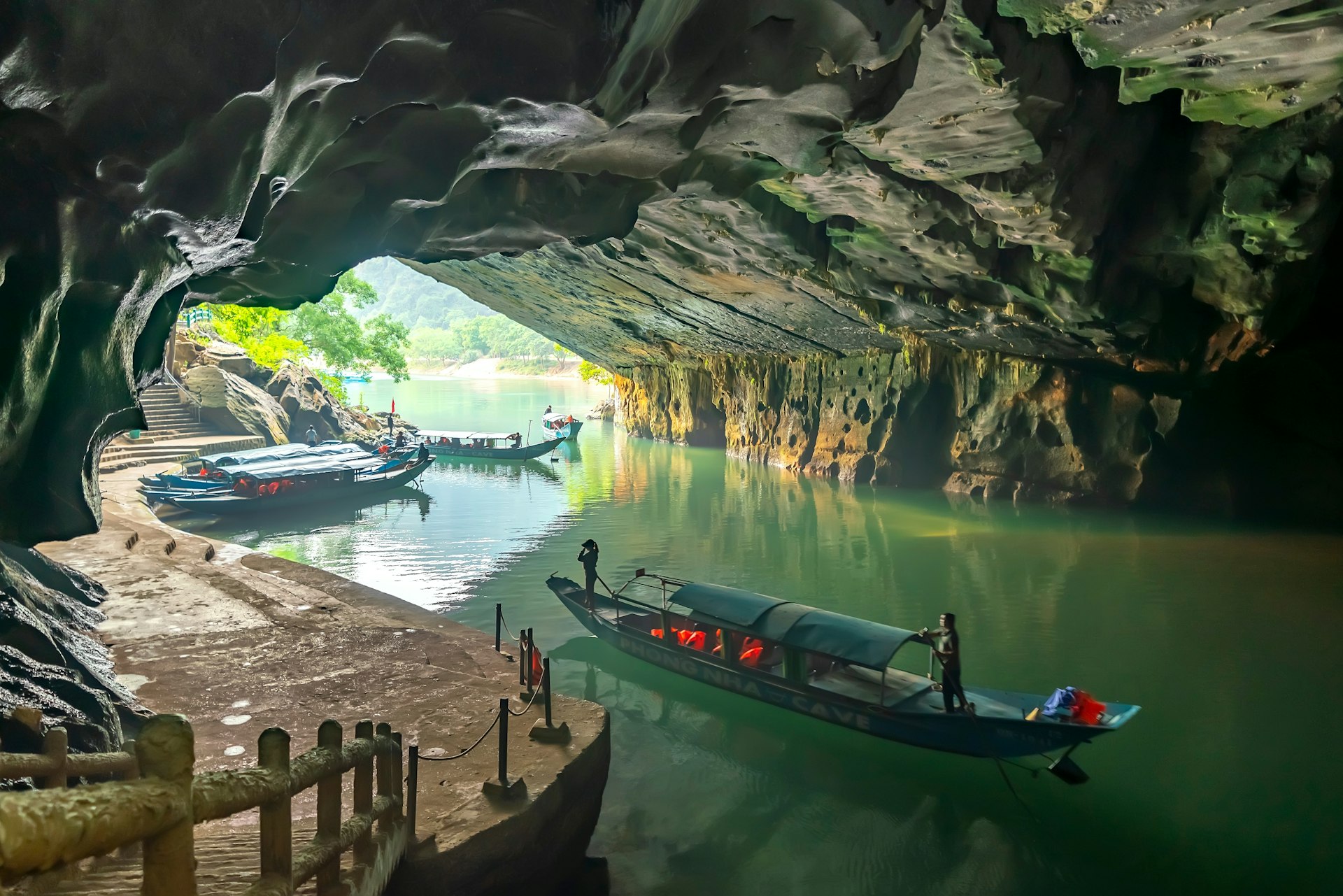 Boats inside Phong Nha Cave in Phong Nha-Ke Bang National Park, a UNESCO World Heritage Site in Vietnam. 