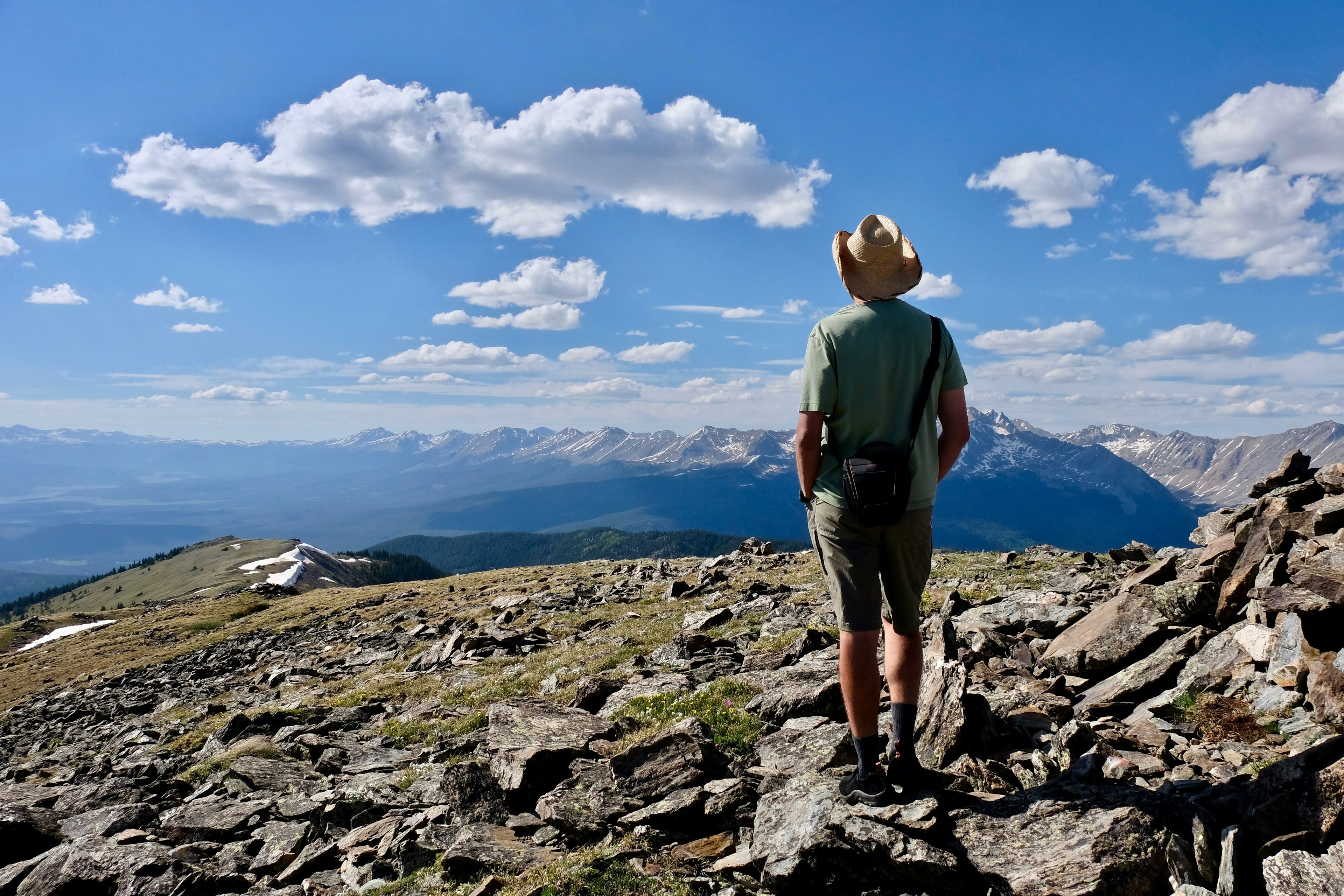 Man pausing to admire the views above Aspen, Colorado