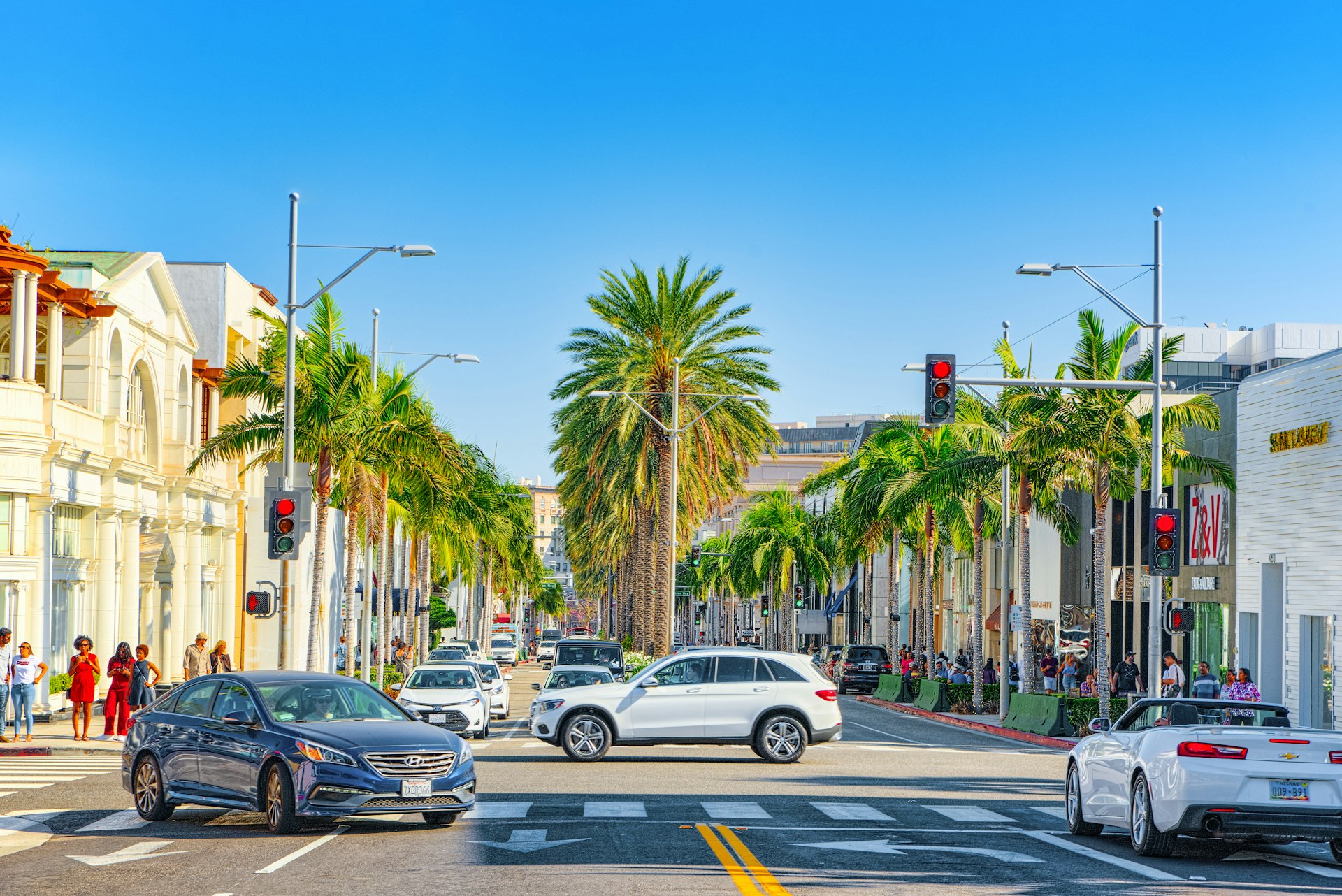 Cars turning on Rodeo Drive in Hollywood.