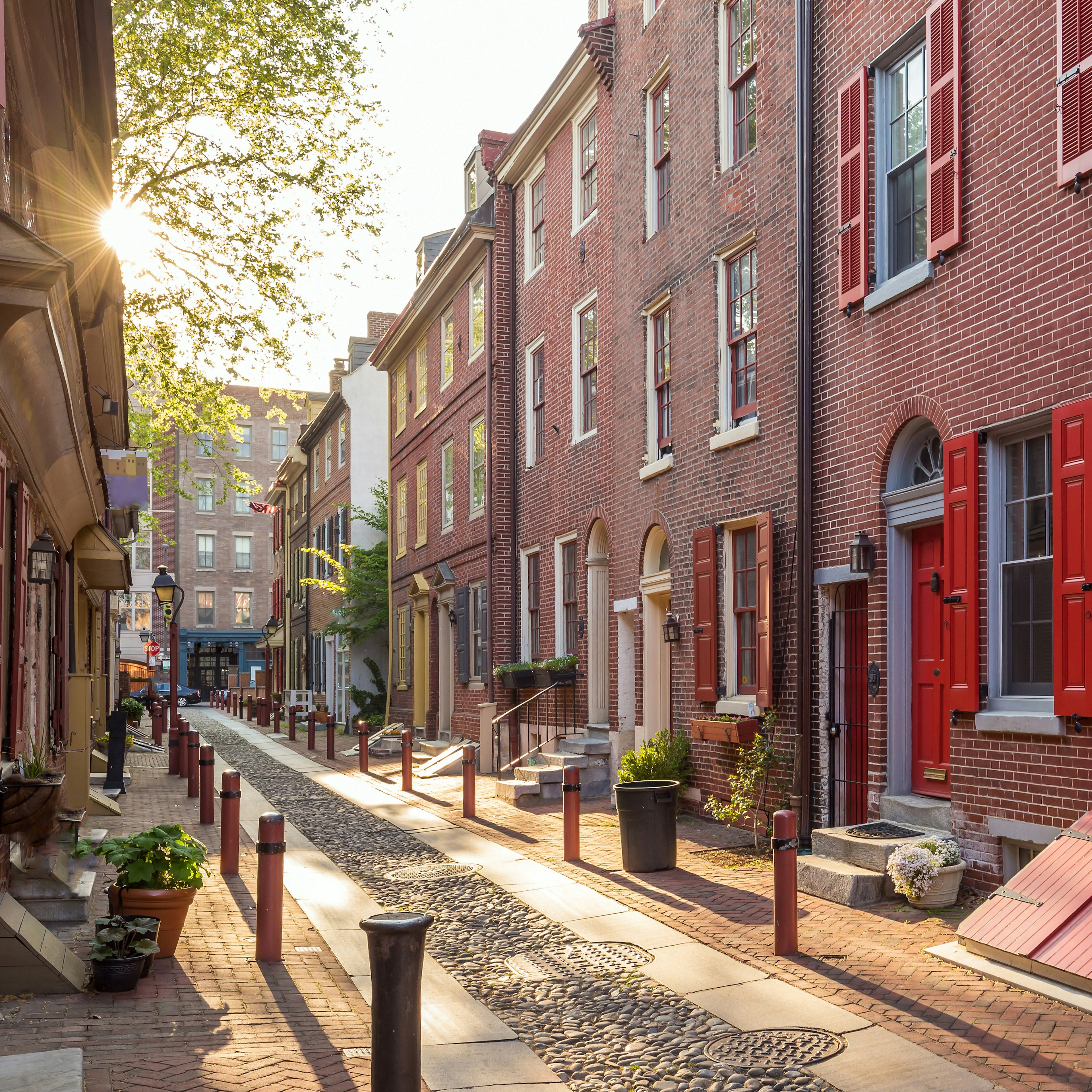 The sun shines on the colorful Elfreth's Alley, referred to as the nation's oldest residential street, located in Philadelphia.