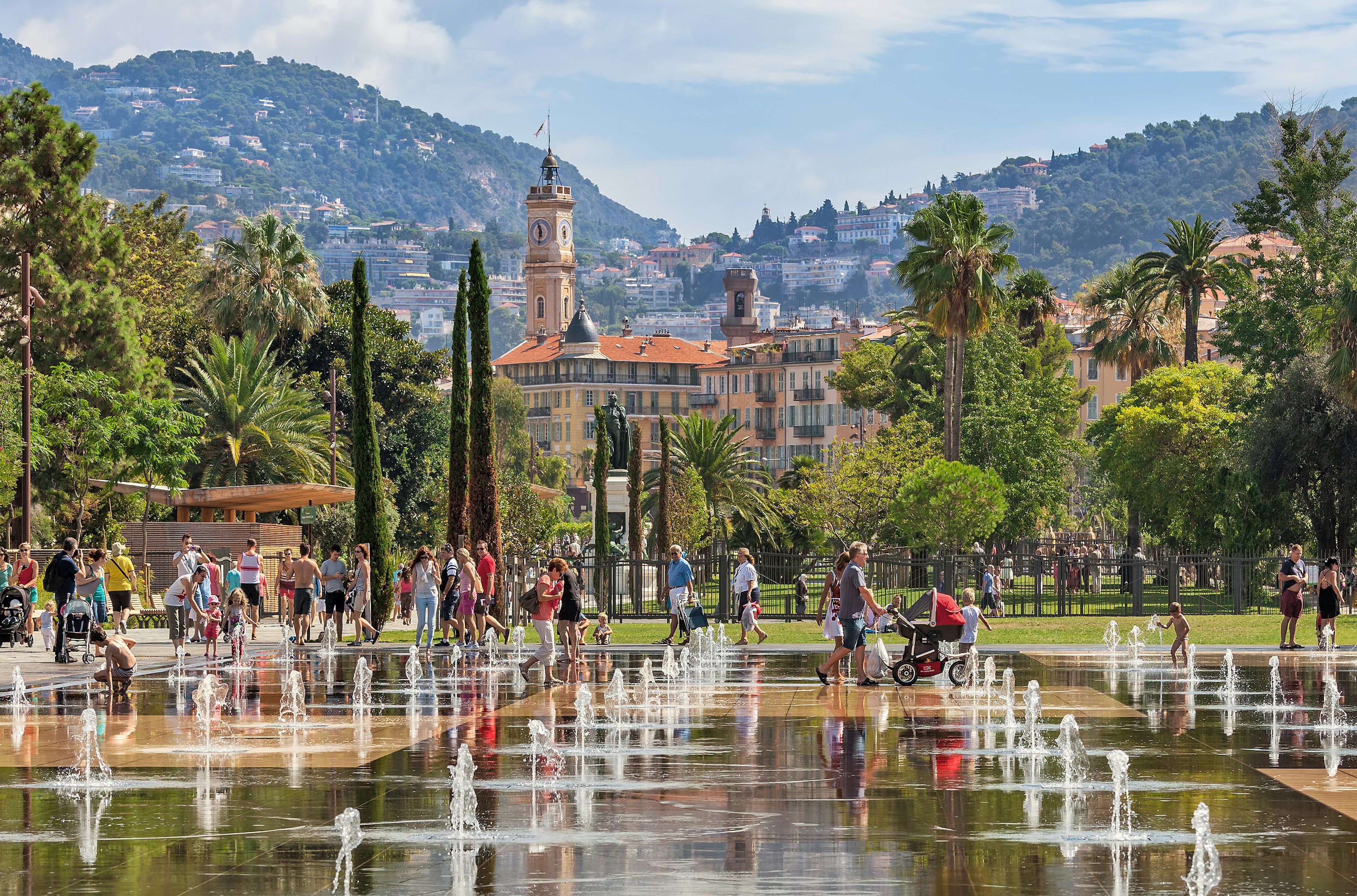 People walking and playing among the fountains at Promenade du Paillon in Nice