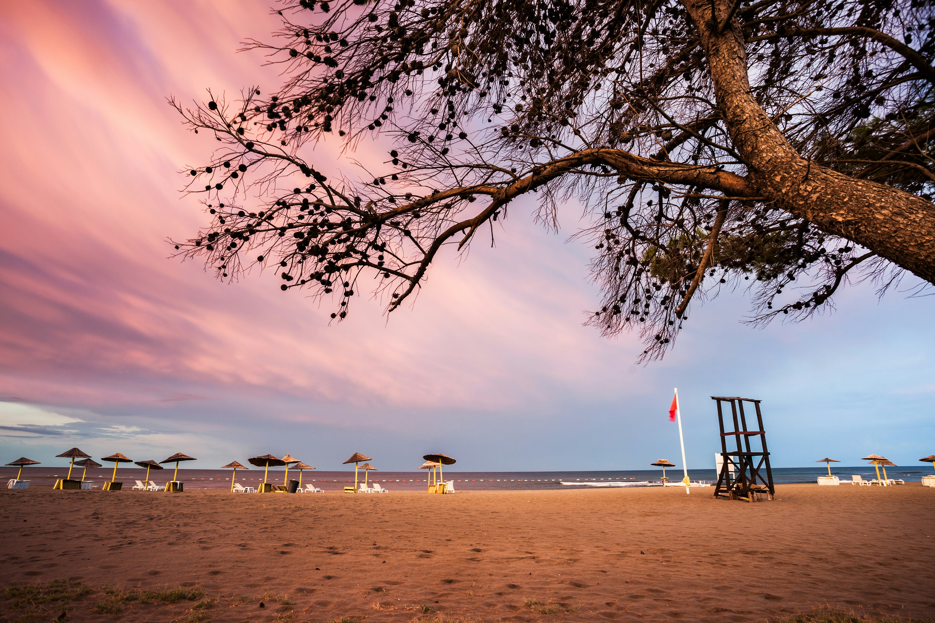 A quiet sandy beach at sunrise in Ada Bojana