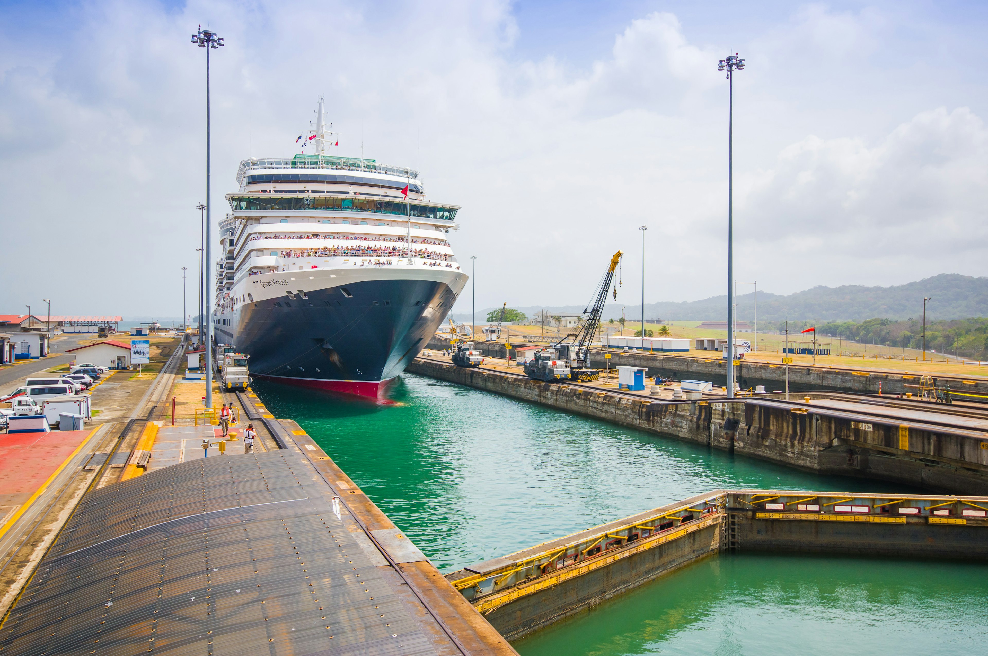 The Queen Victoria navigating the Panama Canal, is classified as a 'Panamax' vessel, the largest the canal can accommodate. Gatun Locks.