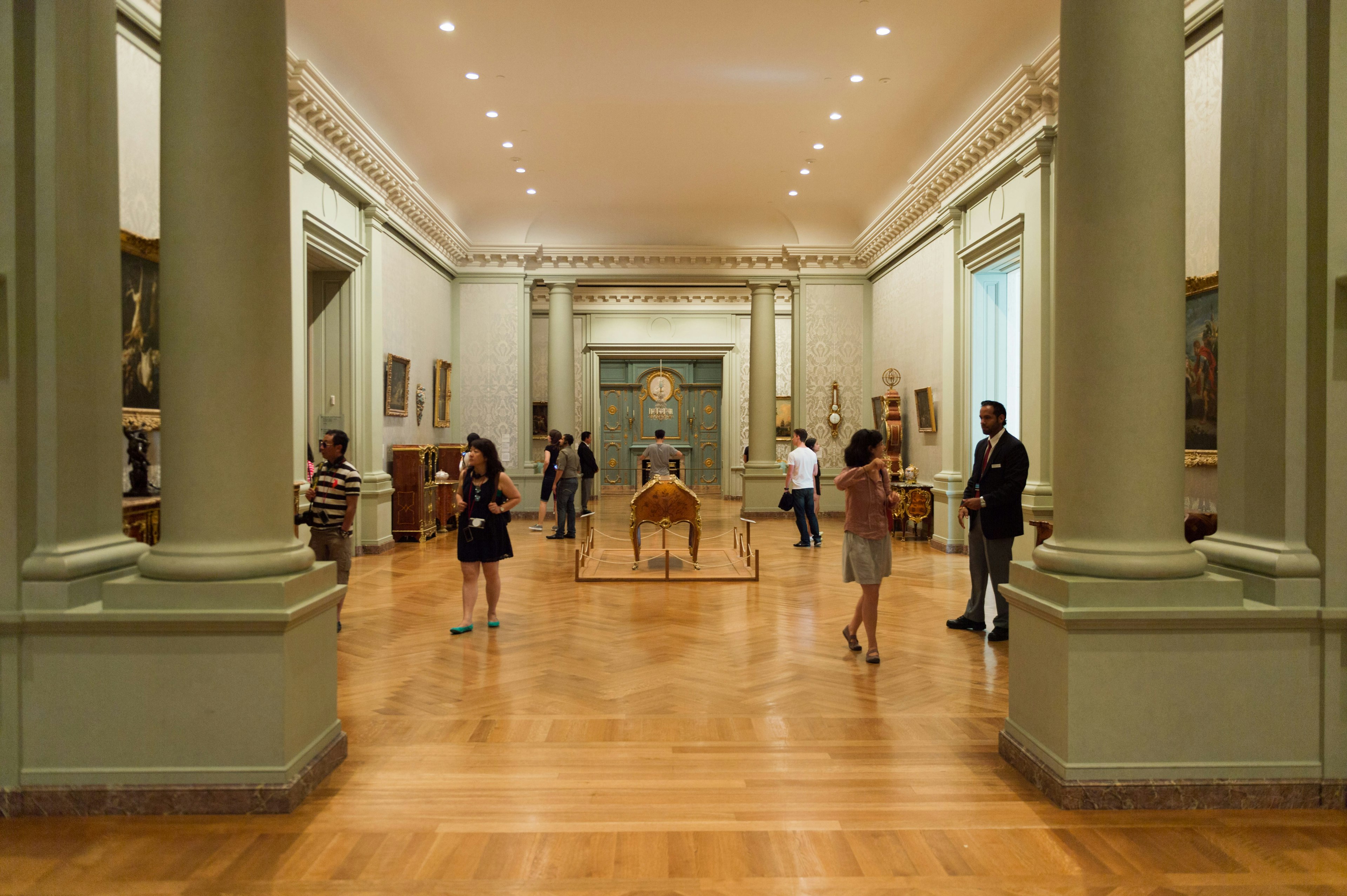 People looking at art in a gallery at the Getty Museum