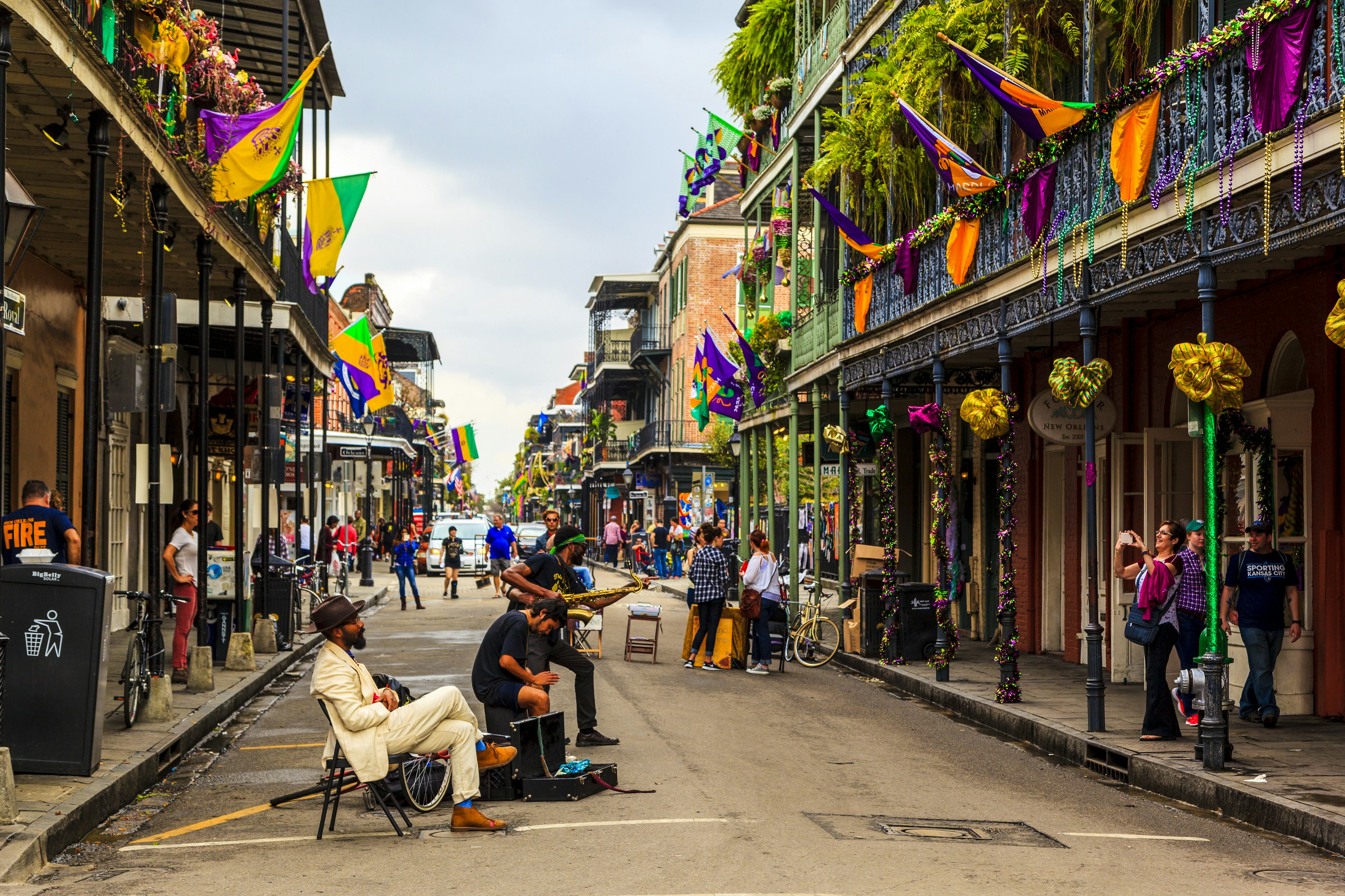 An unidentified  local jazz band performs  in the New Orleans French Quarter, to the delight of visitors and music lovers  in town.