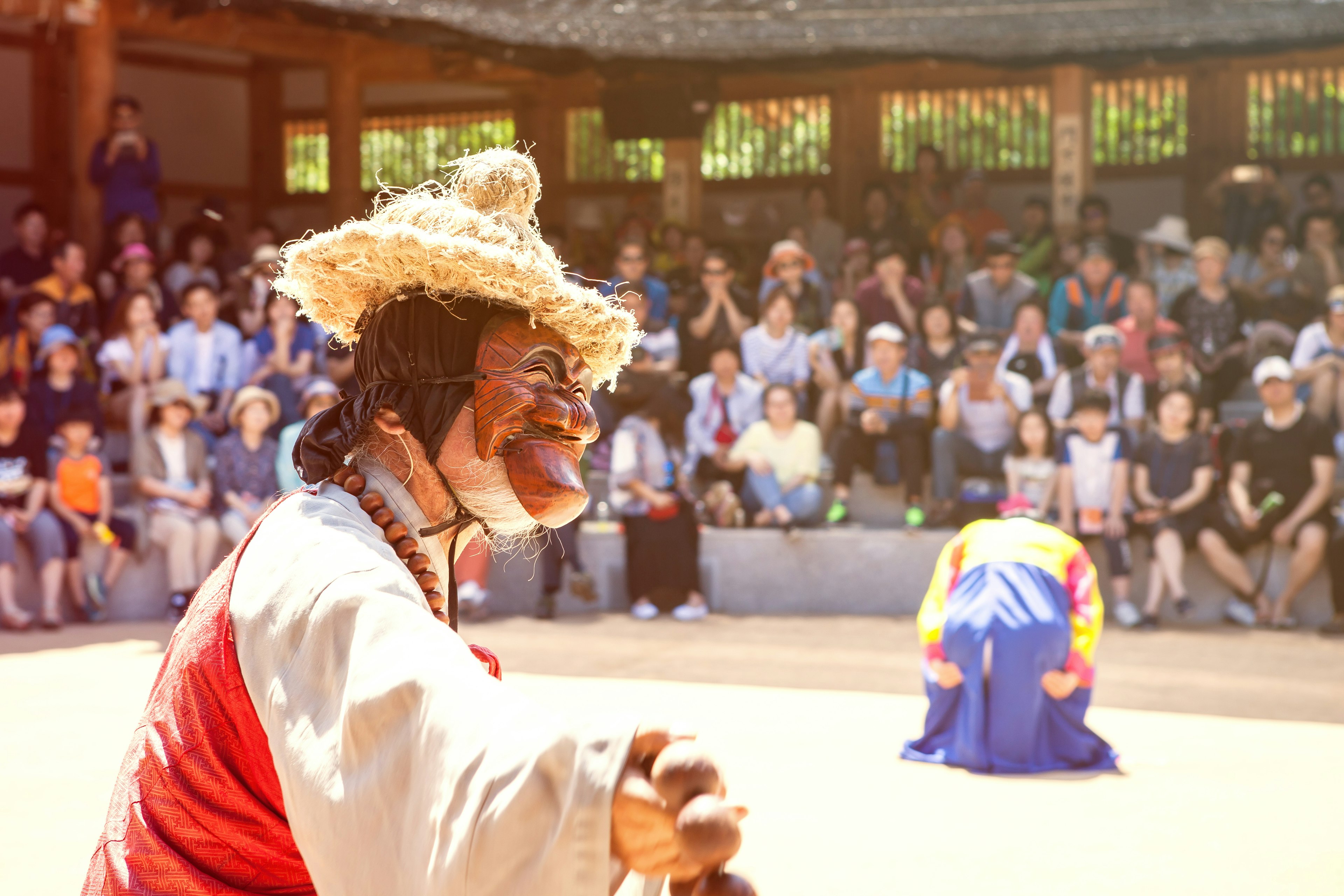 Locals perform a traditional Korean mask dance in Andong's Hahoe Village