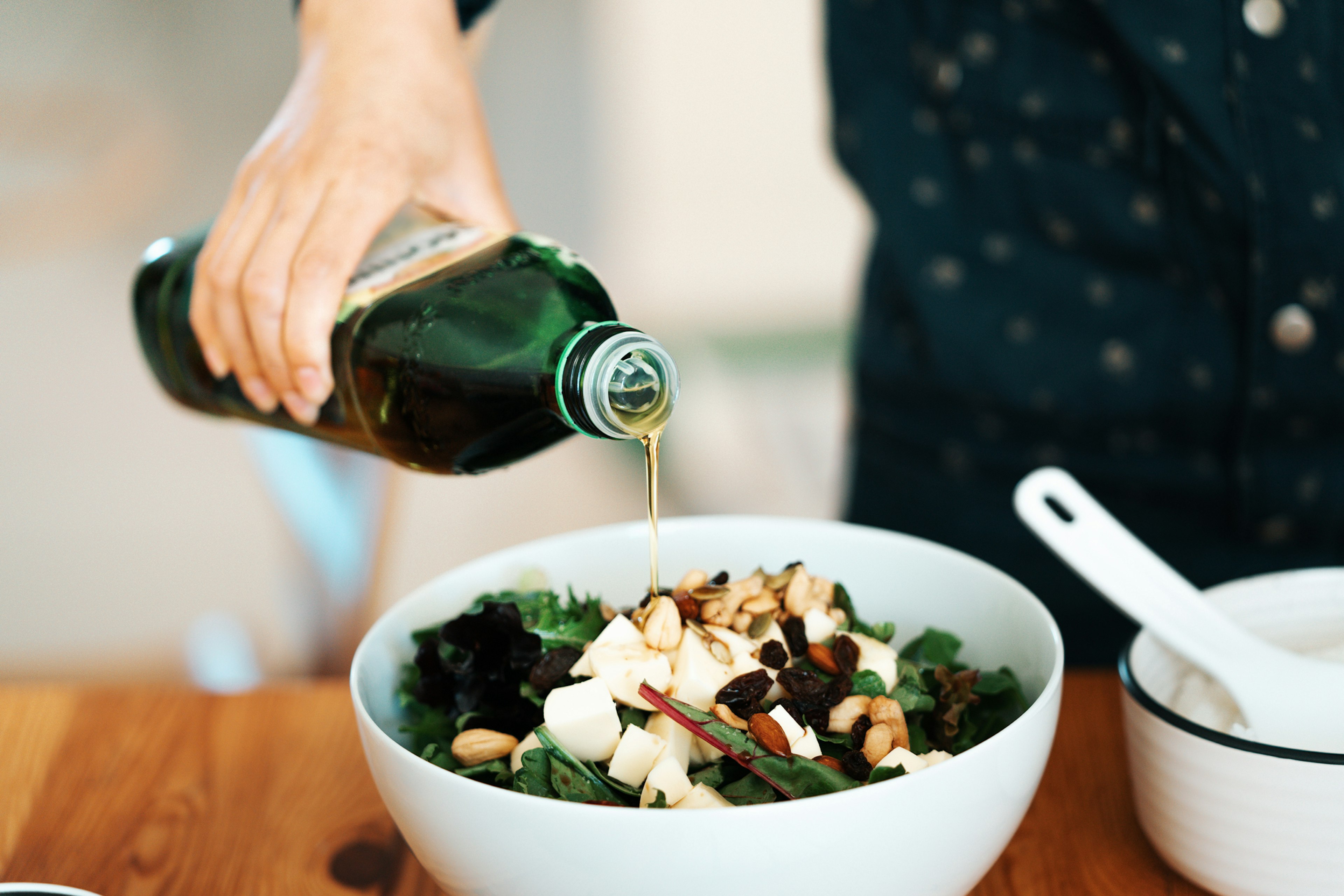 Homemade Gourmet Food: Fresh Green Salad with Mozzarella, Mixed Nuts and Dry Fruits