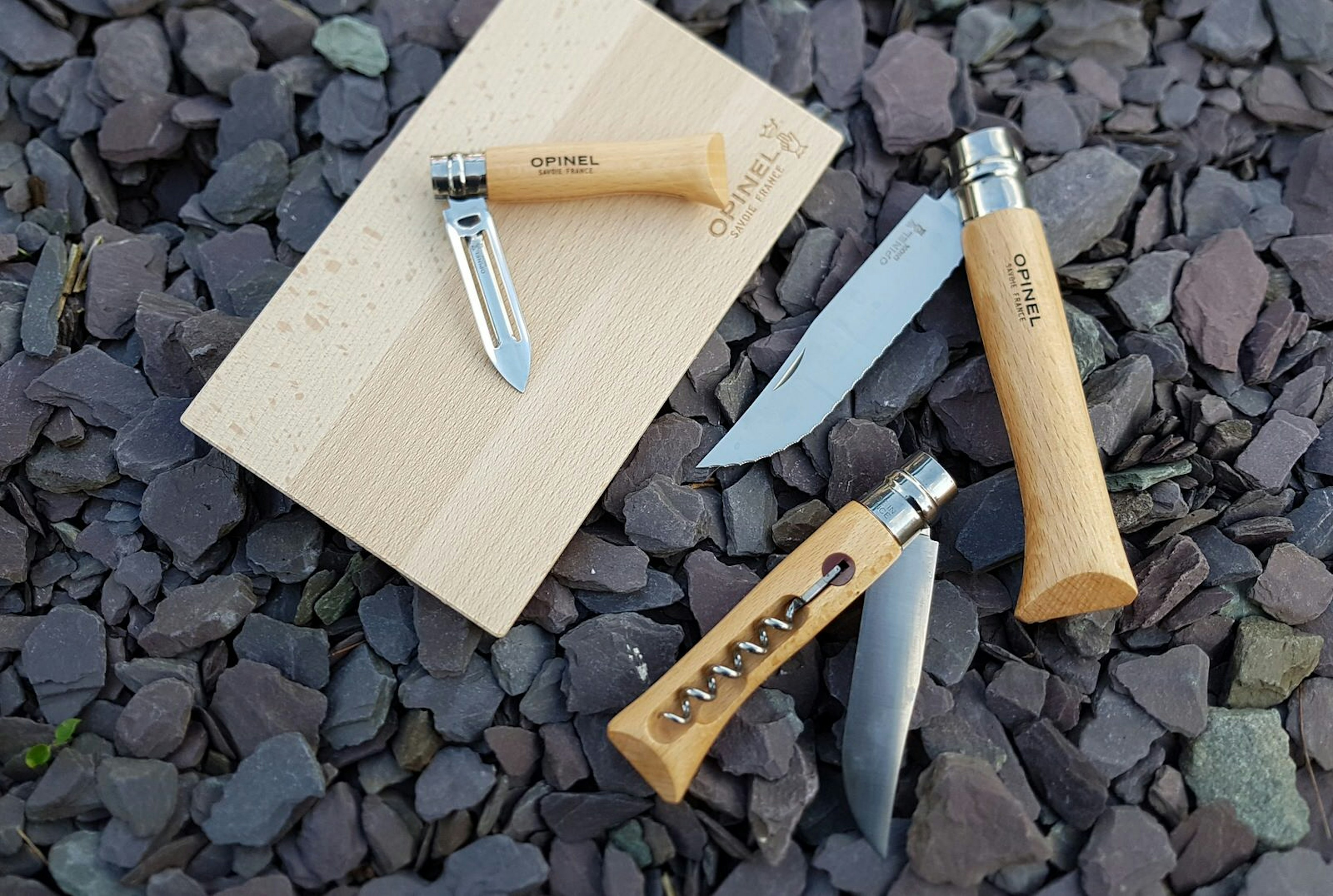 Opinel Nomad Cooking Kit, including two knives, vegetable peeler, chopping board and cork screw