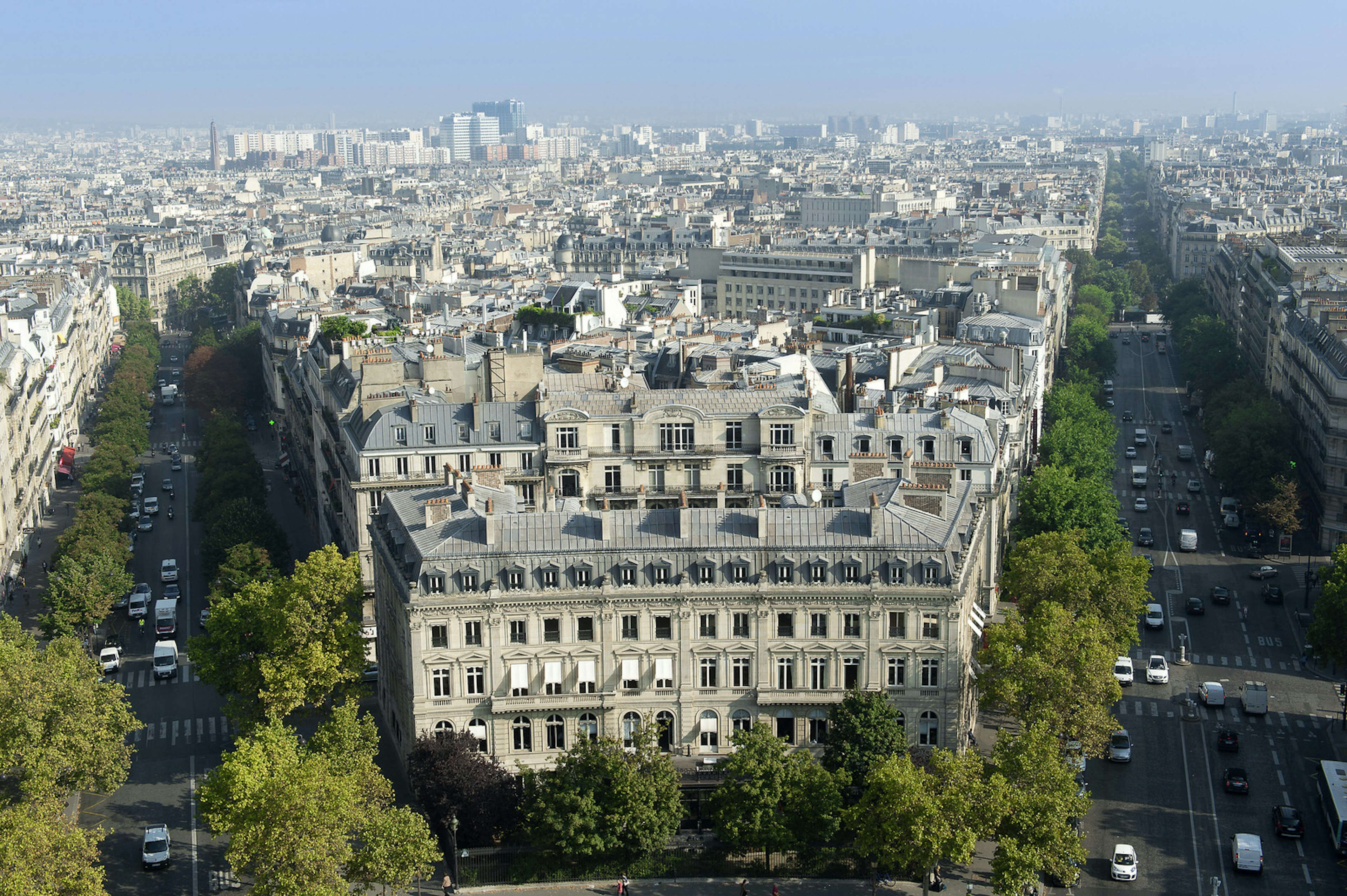 Trees line the avenues of residential apartment blocks in Paris, France