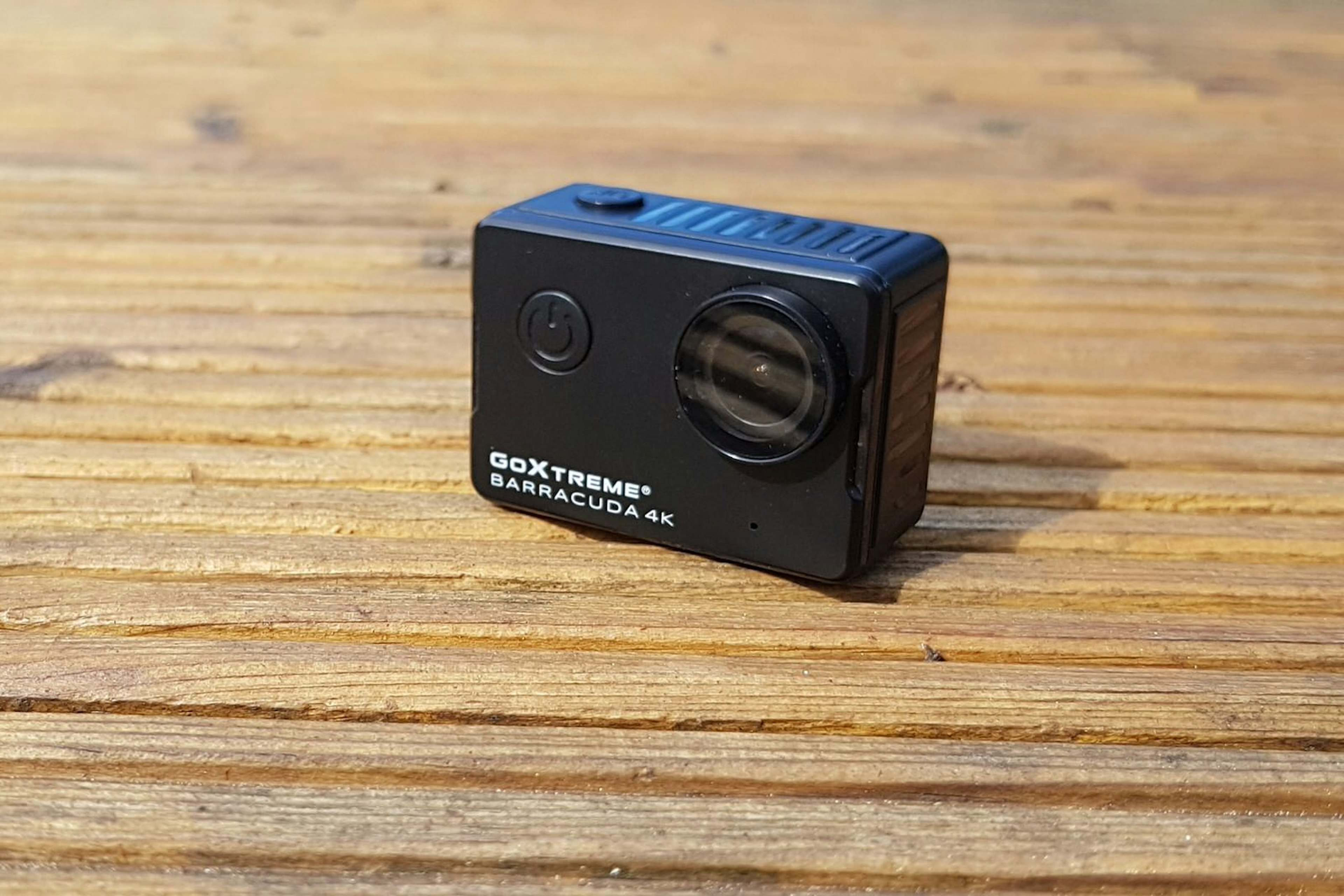 GoXtreme Barracuda, a small, square video camera with a minimalist design