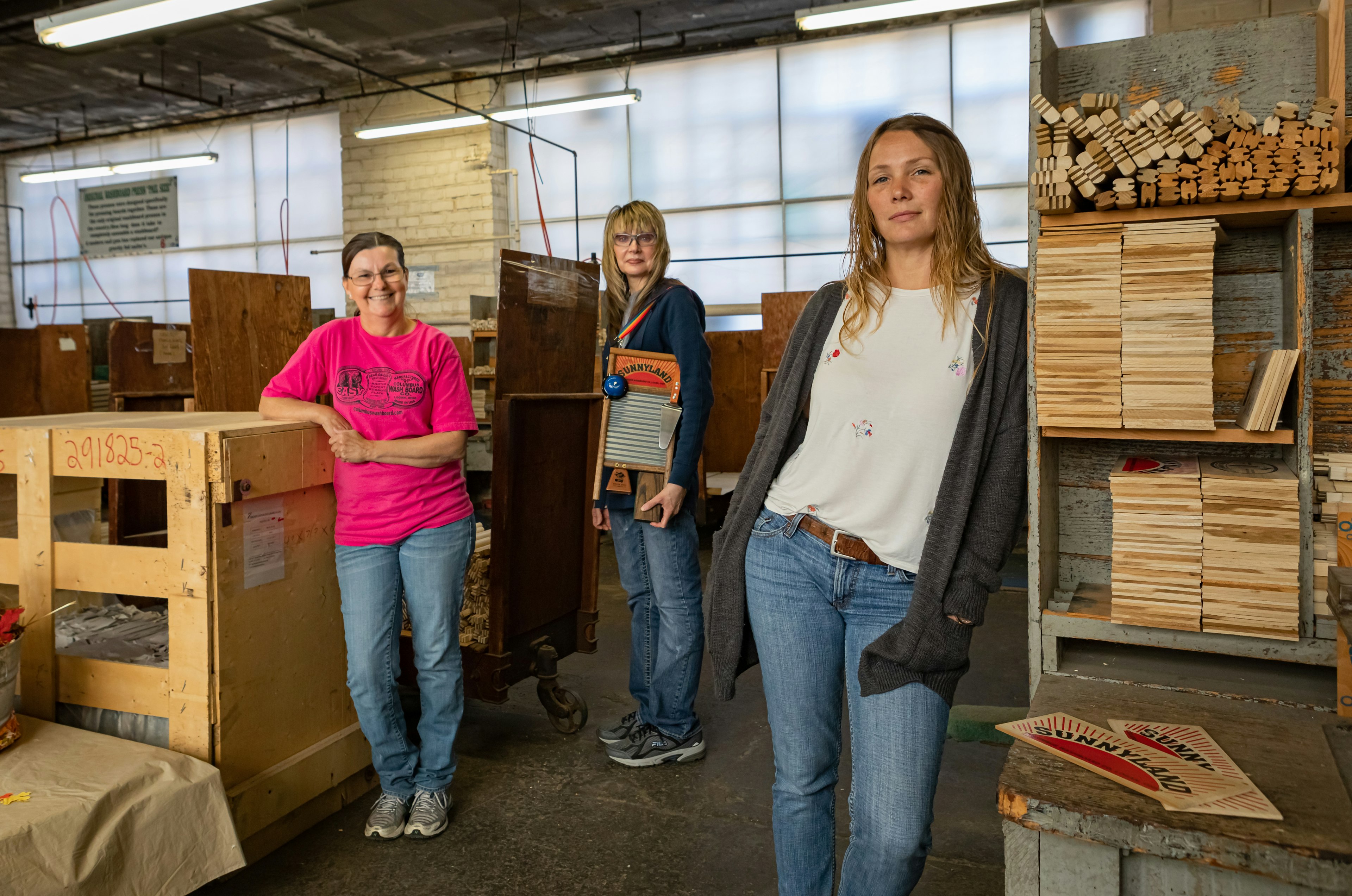 Three women at the Columbus Washboard Company factory floor